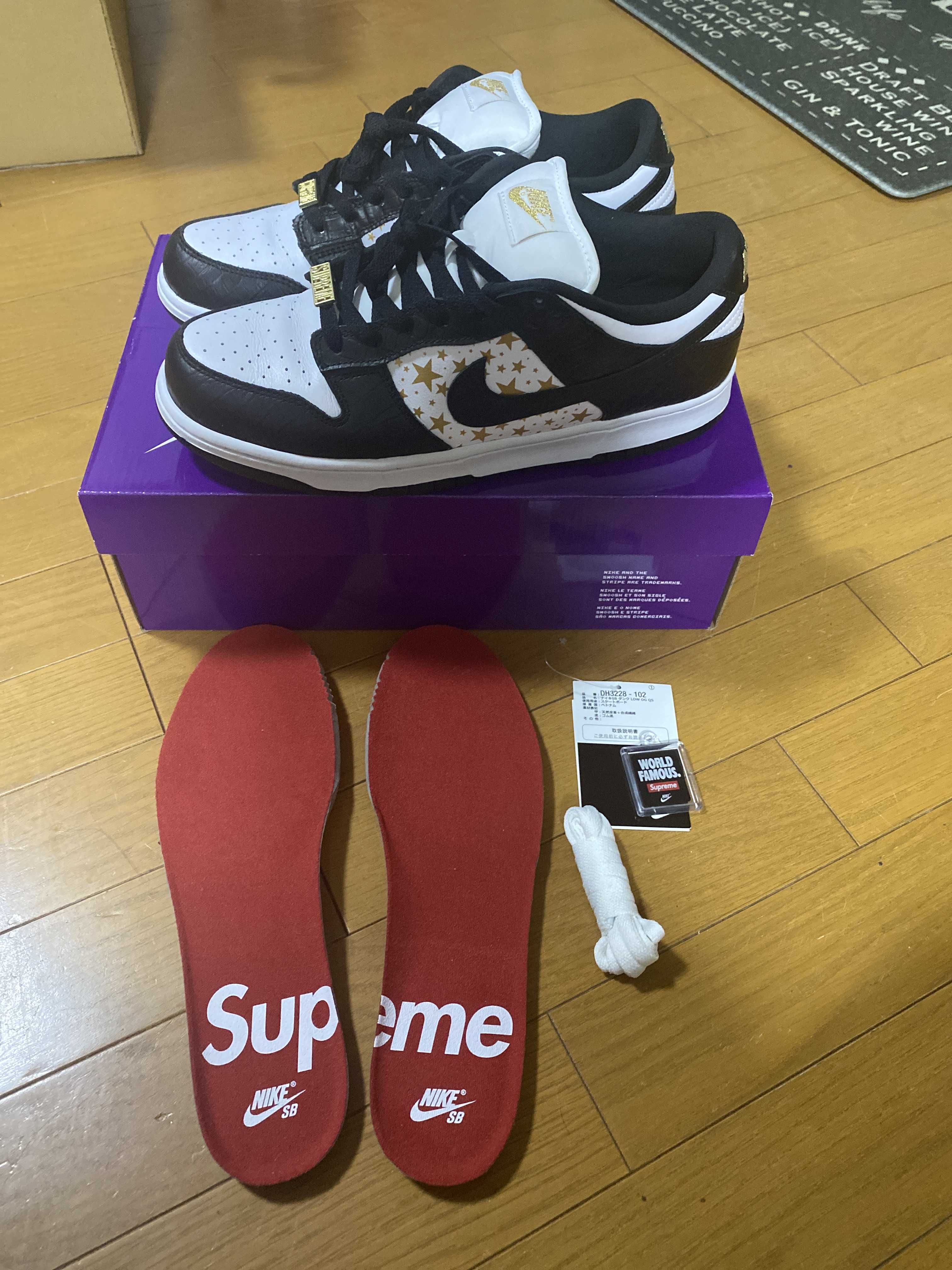 Supreme × Nike SB Dunk Low OG QS Gold Stars "White/Black"