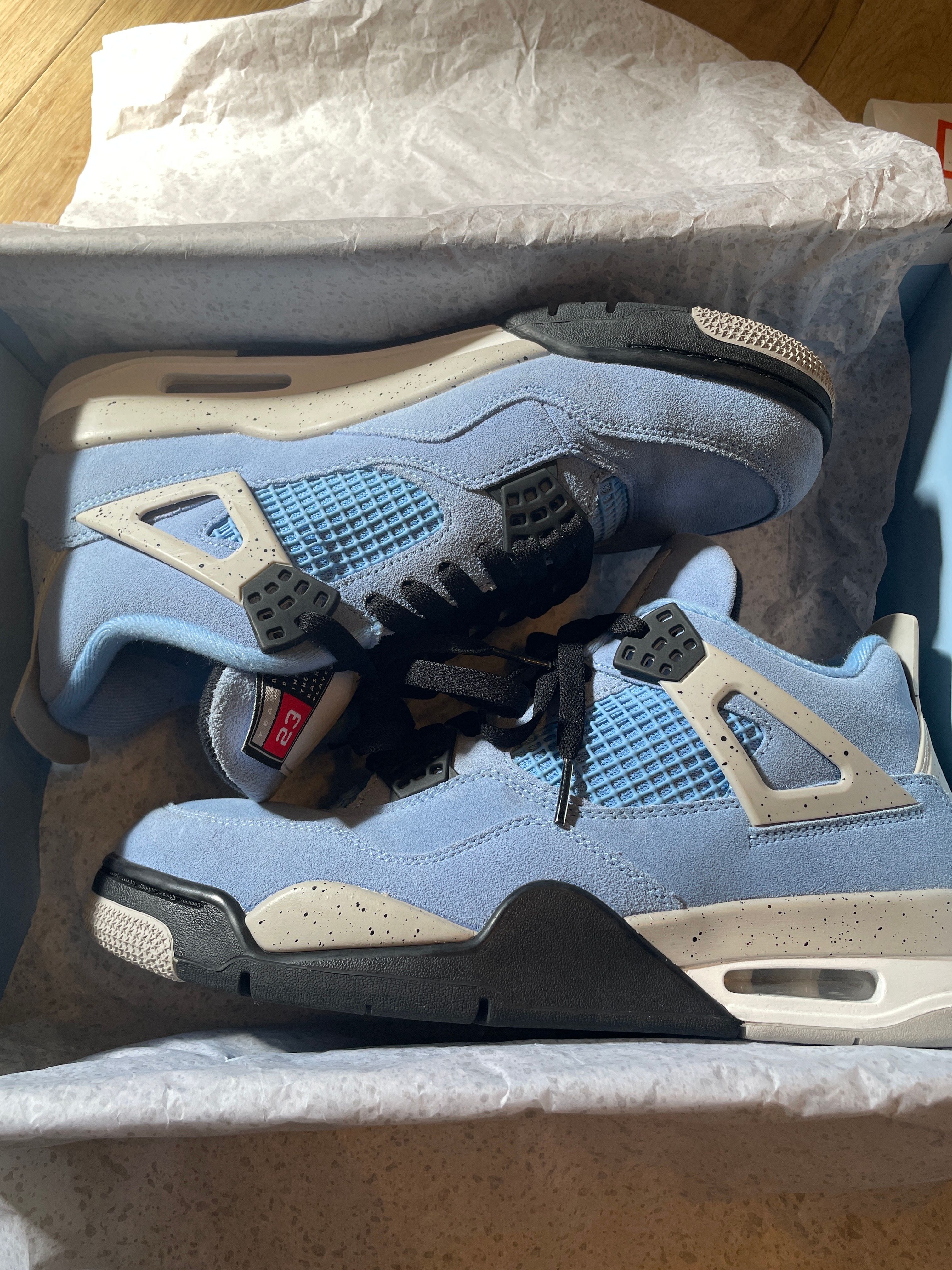 Nike Air Jordan 4 "University Blue"