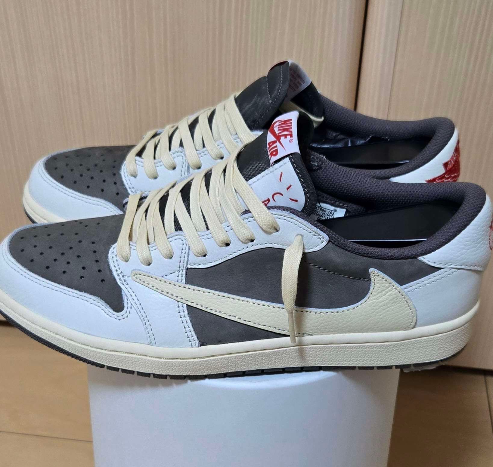 Travis Scott × Nike Air Jordan 1 Low OG SP "Reverse Mocha/Sail and Ridgerock"