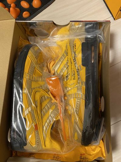 Off-White × Nike Air Rubber Dunk "University Gold"