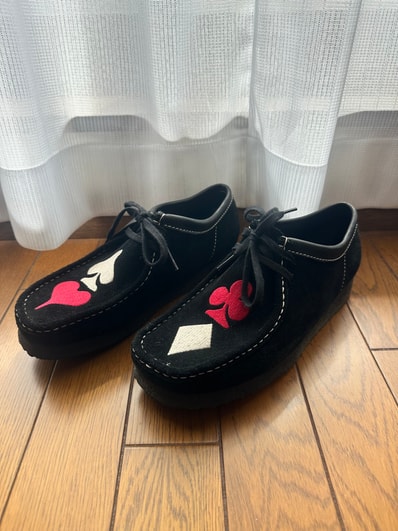 Stussy × Clarks Wallabee "Black Suede/Red/Gold"