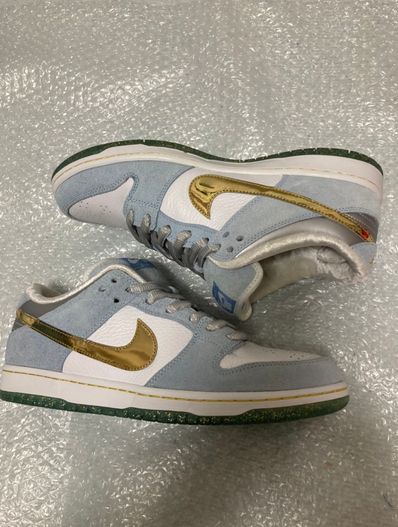 Sean Cliver × Nike SB Dunk Low "Holiday Special"