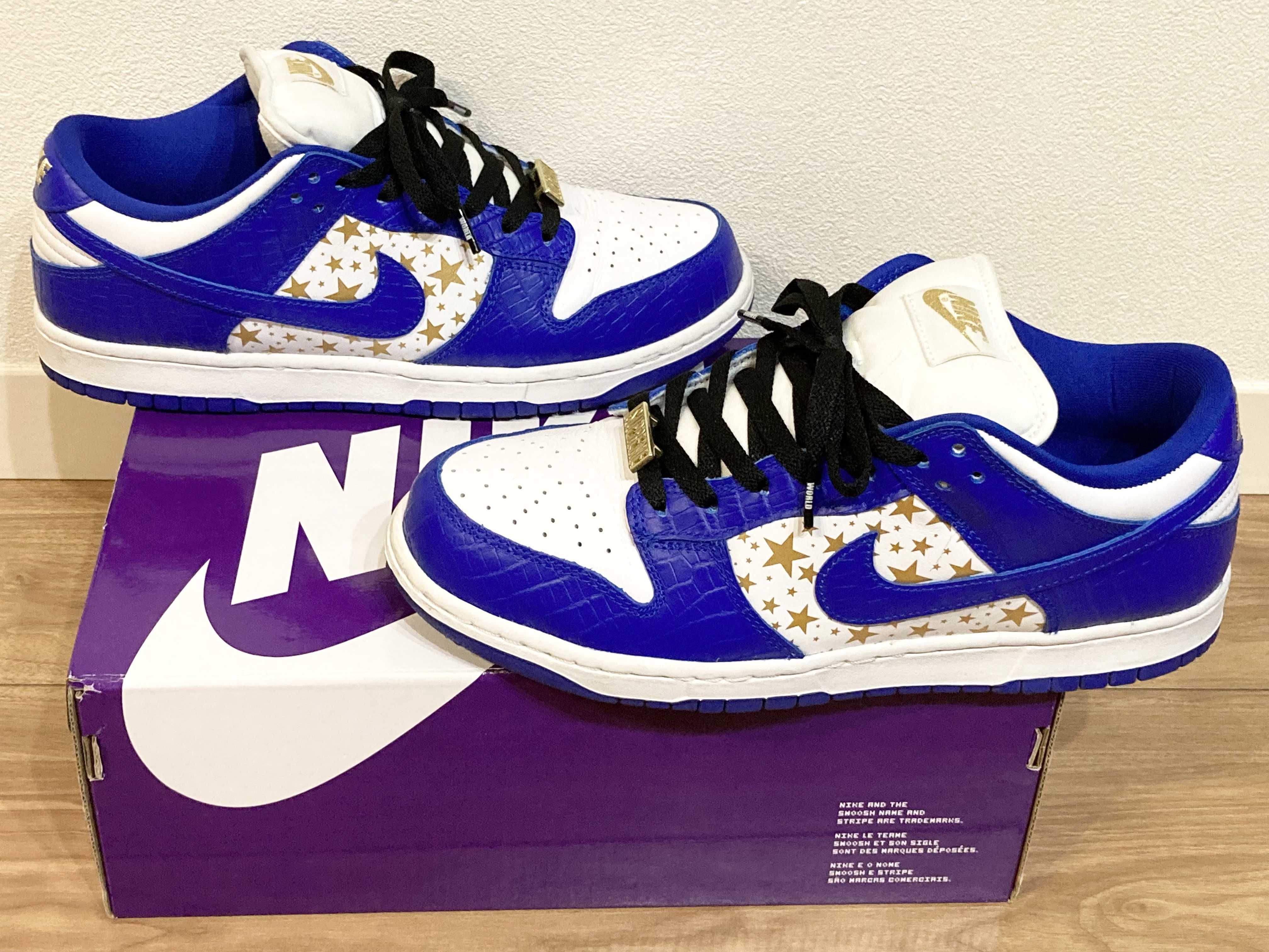 Supreme × Nike SB Dunk Low OG QS Gold Stars "White/Hyper Blue"