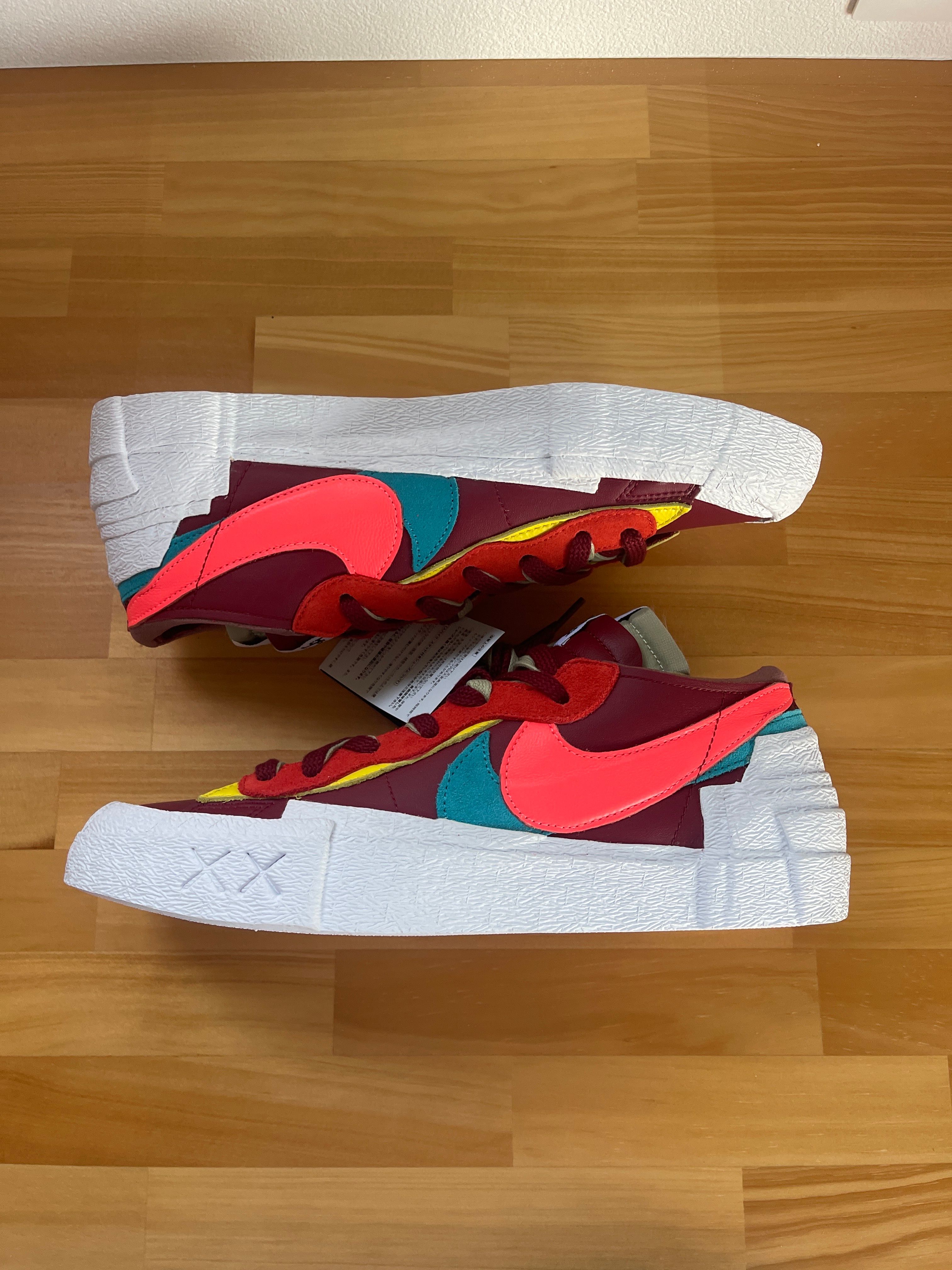 KAWS × sacai × Nike Blazer Low "Team Red"