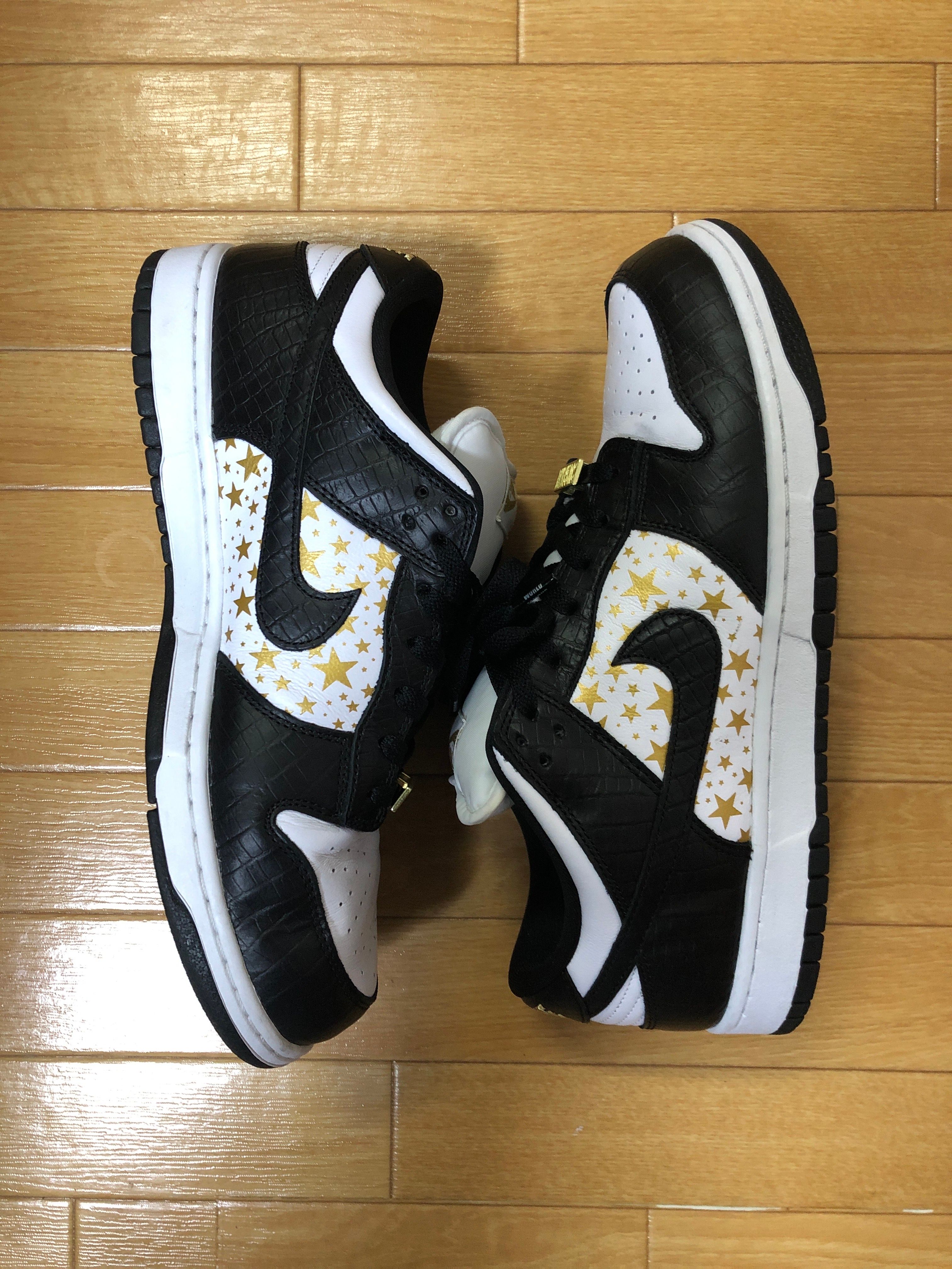 Supreme × Nike SB Dunk Low OG QS Gold Stars "White/Black"