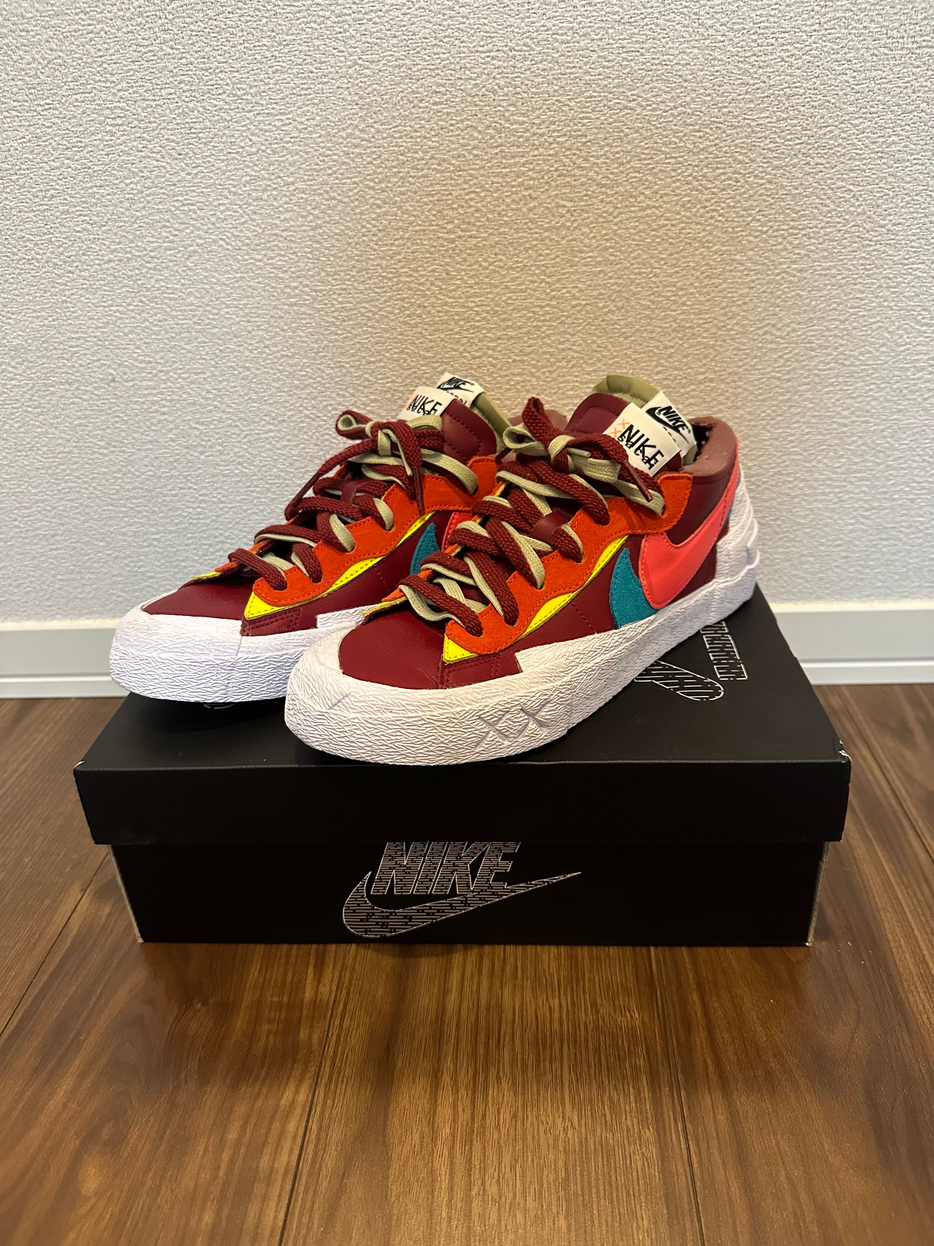 KAWS × sacai × Nike Blazer Low "Team Red"