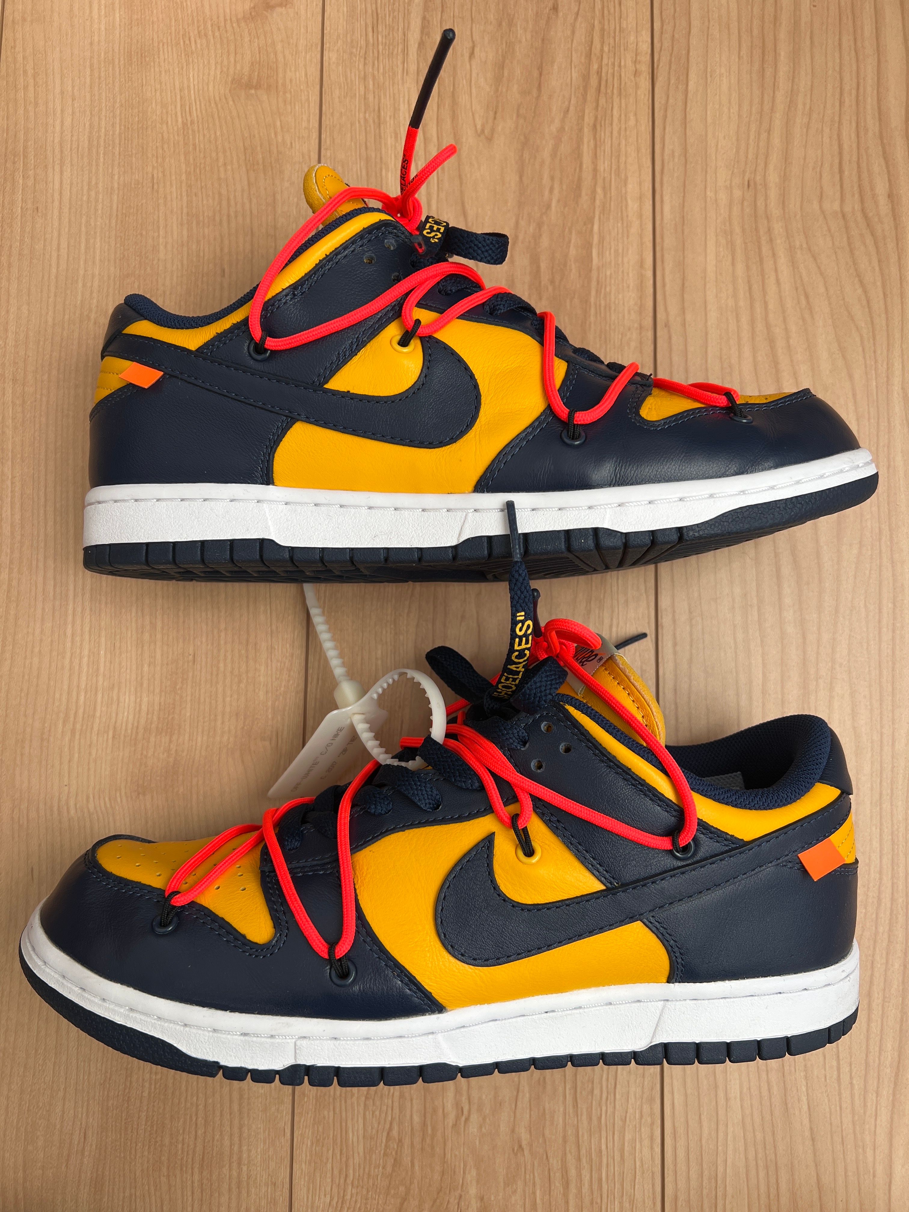 Off-White × Nike Dunk Low LTHR "University Gold/Midnight Navy/White"