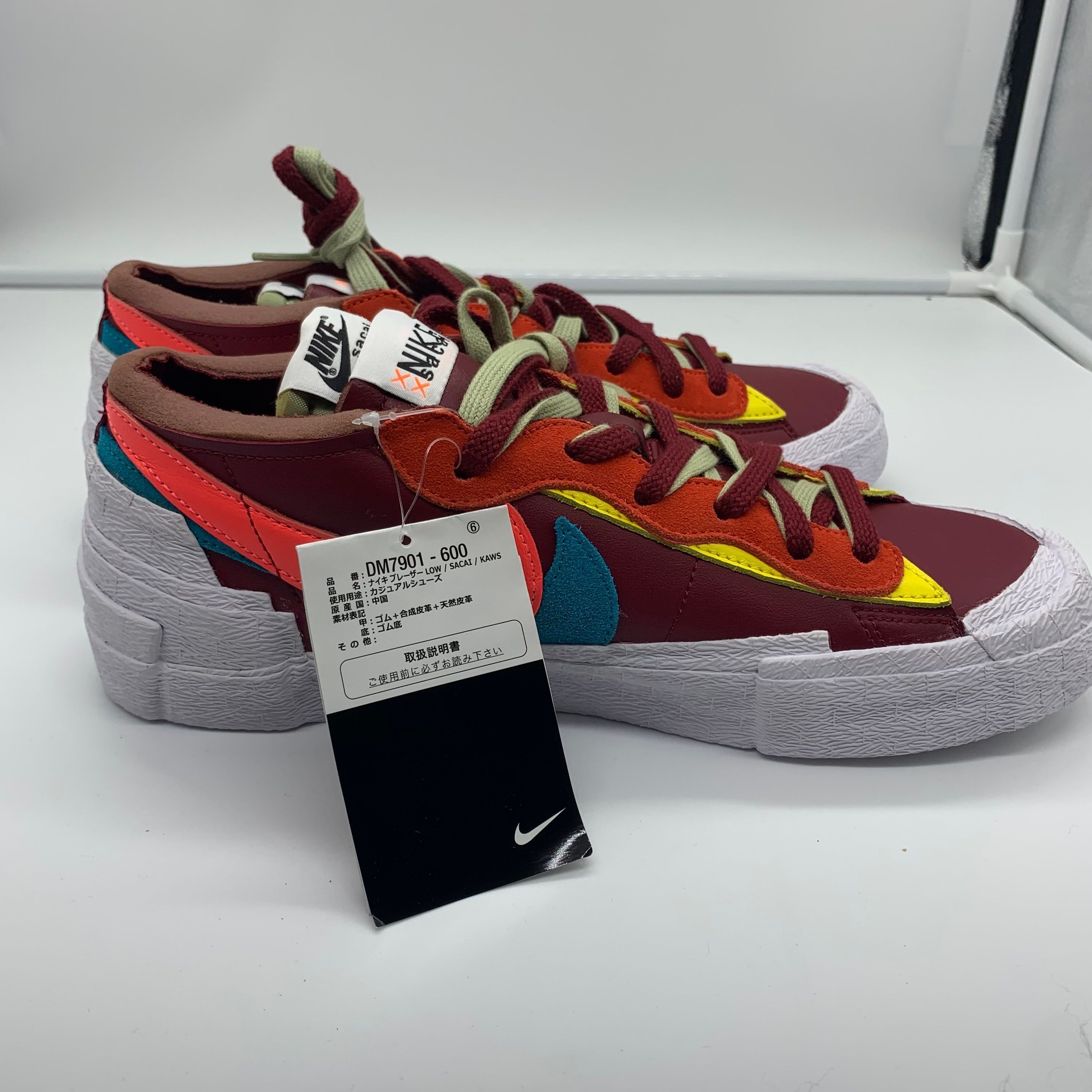 KAWS × sacai × Nike Blazer Low "Team Red"