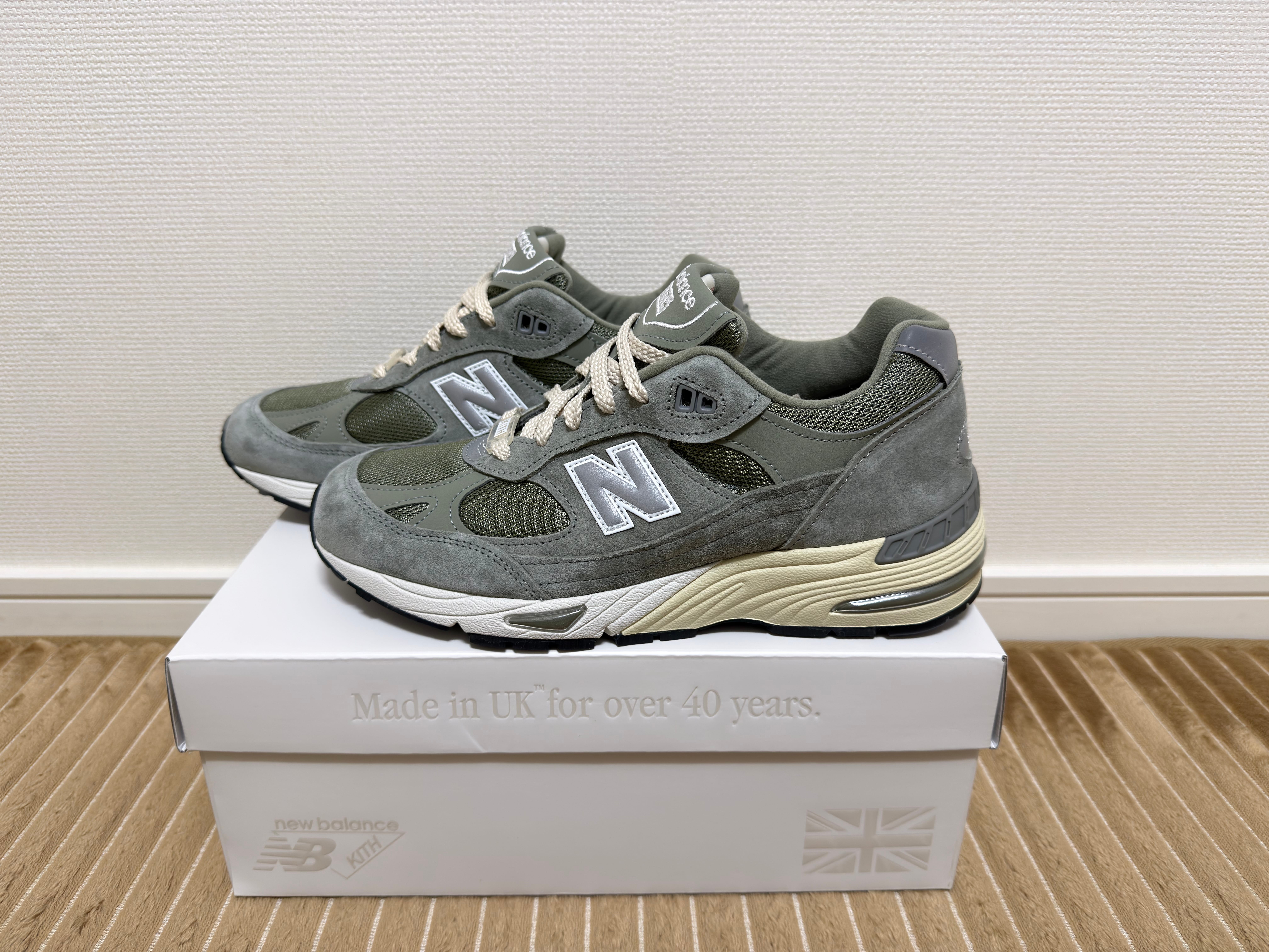 KITH 101 × New Balance 991 "Vetiver"