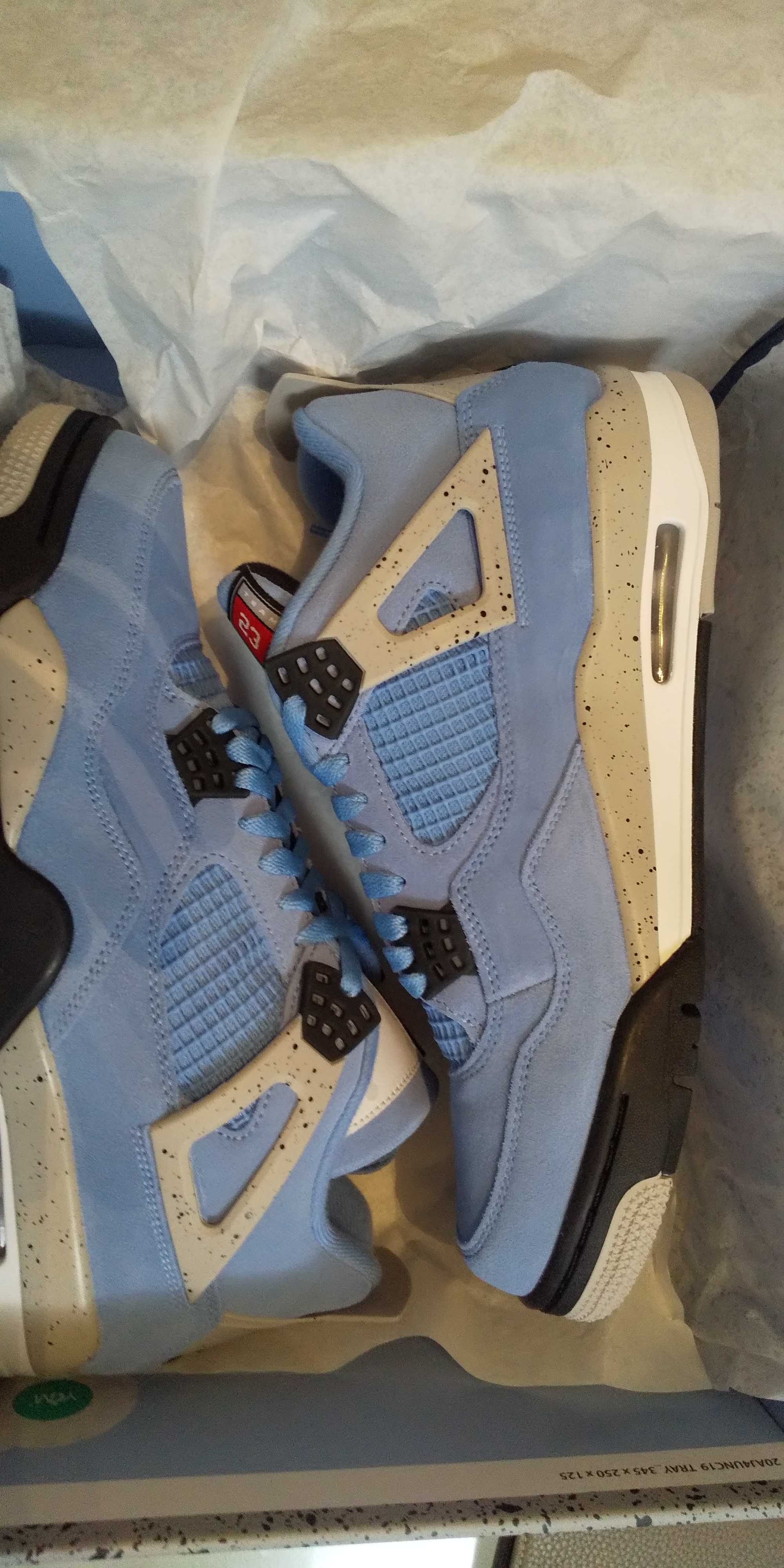 Nike Air Jordan 4 "University Blue"