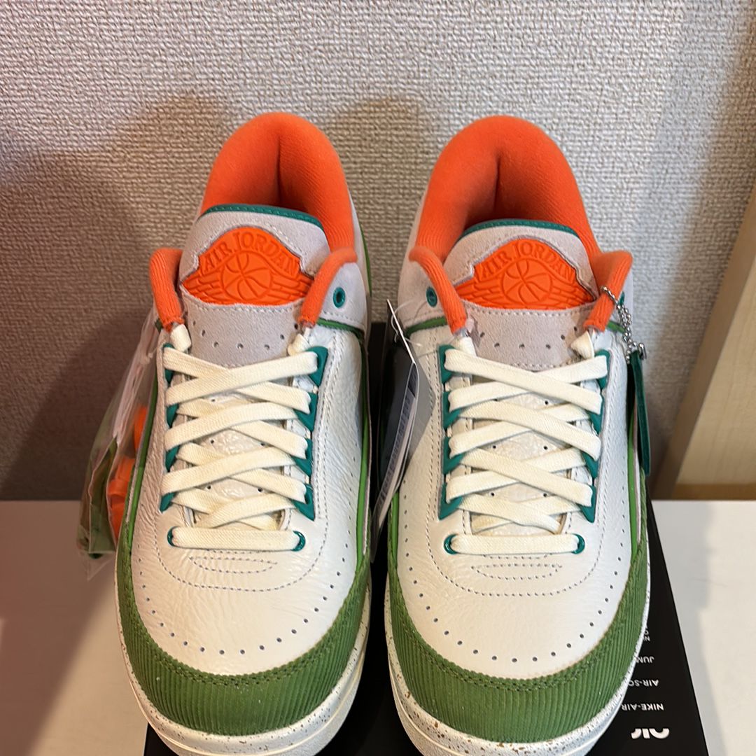 The Titan × Nike Women's Air Jordan 2 Low "Safety Orange/Chlorophyll"