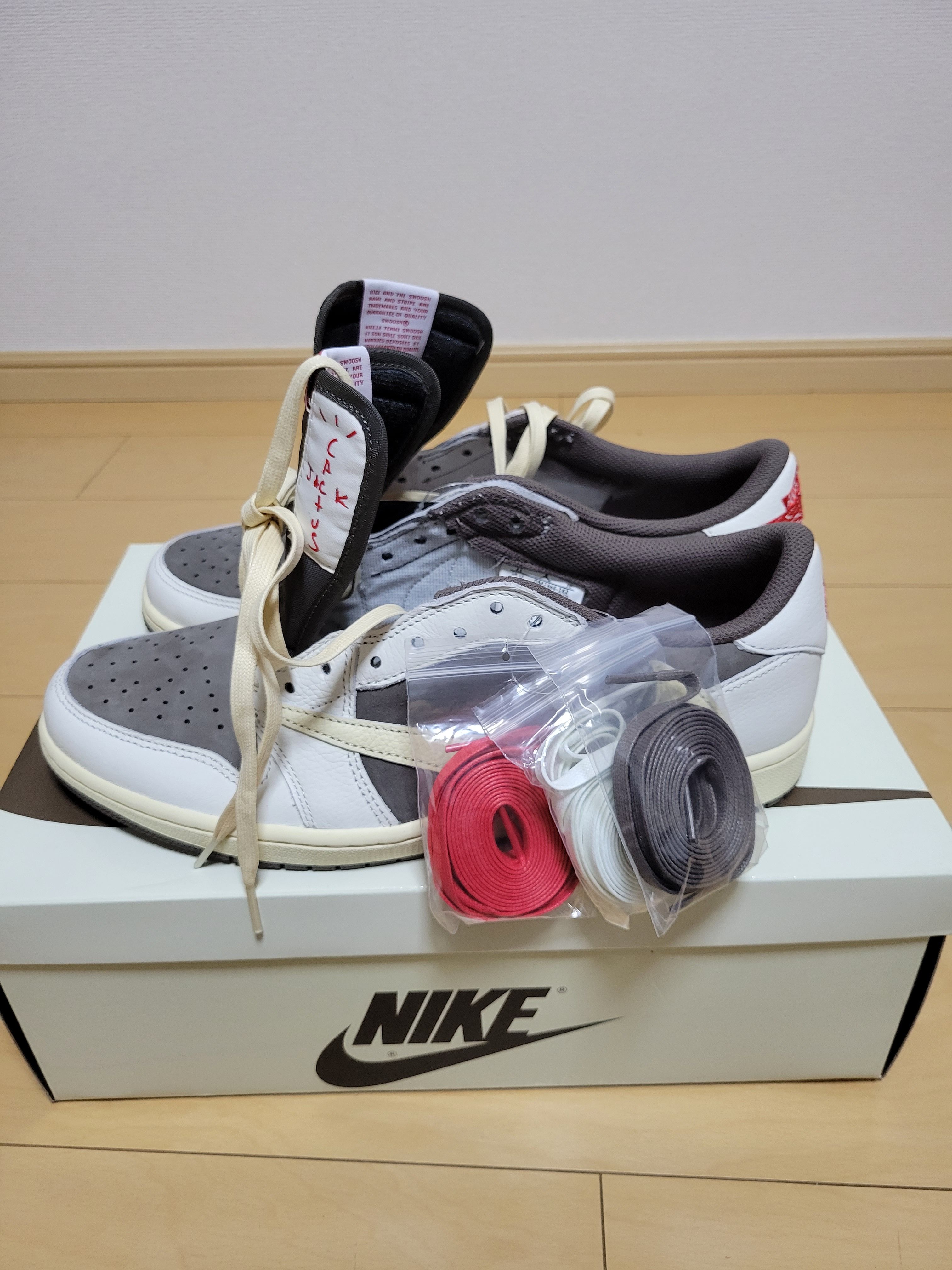 Travis Scott × Nike Air Jordan 1 Low OG SP "Reverse Mocha/Sail and Ridgerock"