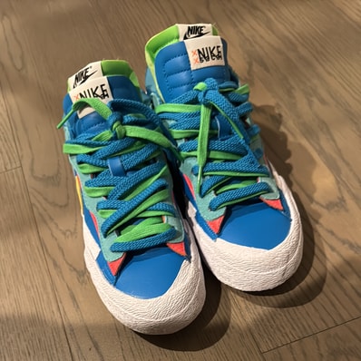 KAWS × sacai × Nike Blazer Low "Neptune Blue"