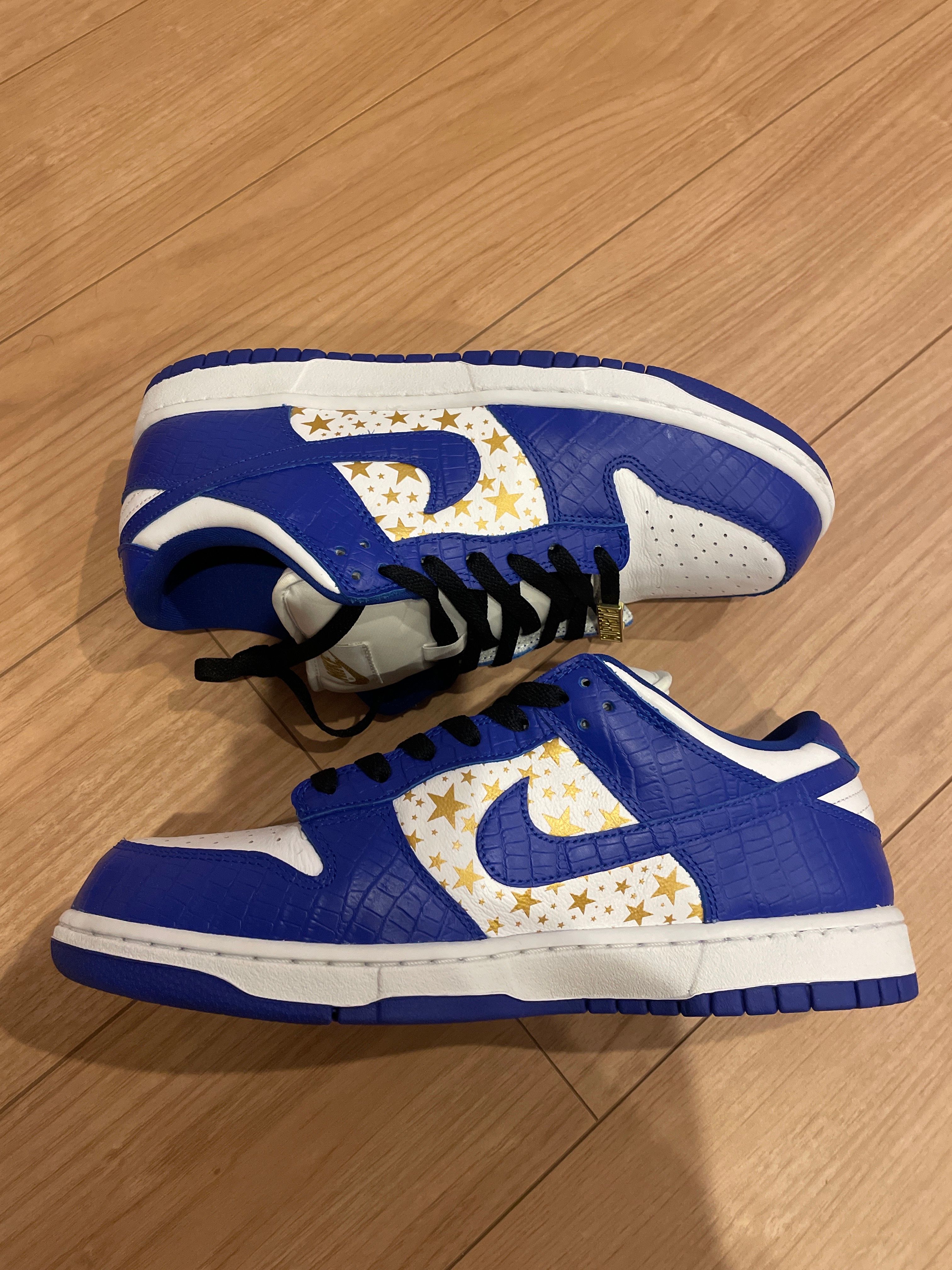 Supreme × Nike SB Dunk Low OG QS Gold Stars "White/Hyper Blue"