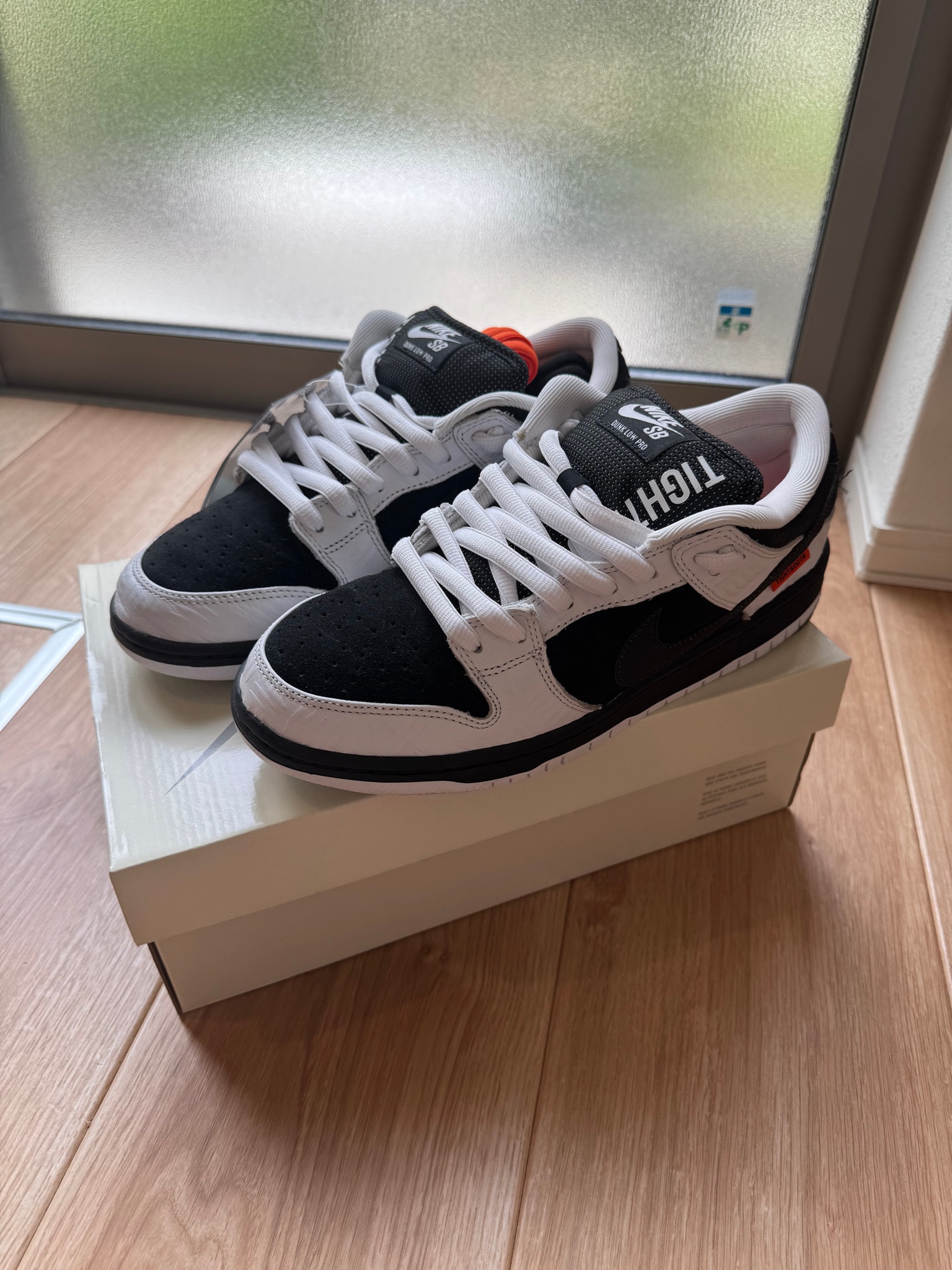 TIGHTBOOTH × Nike SB Dunk Low Pro QS "Black and White"