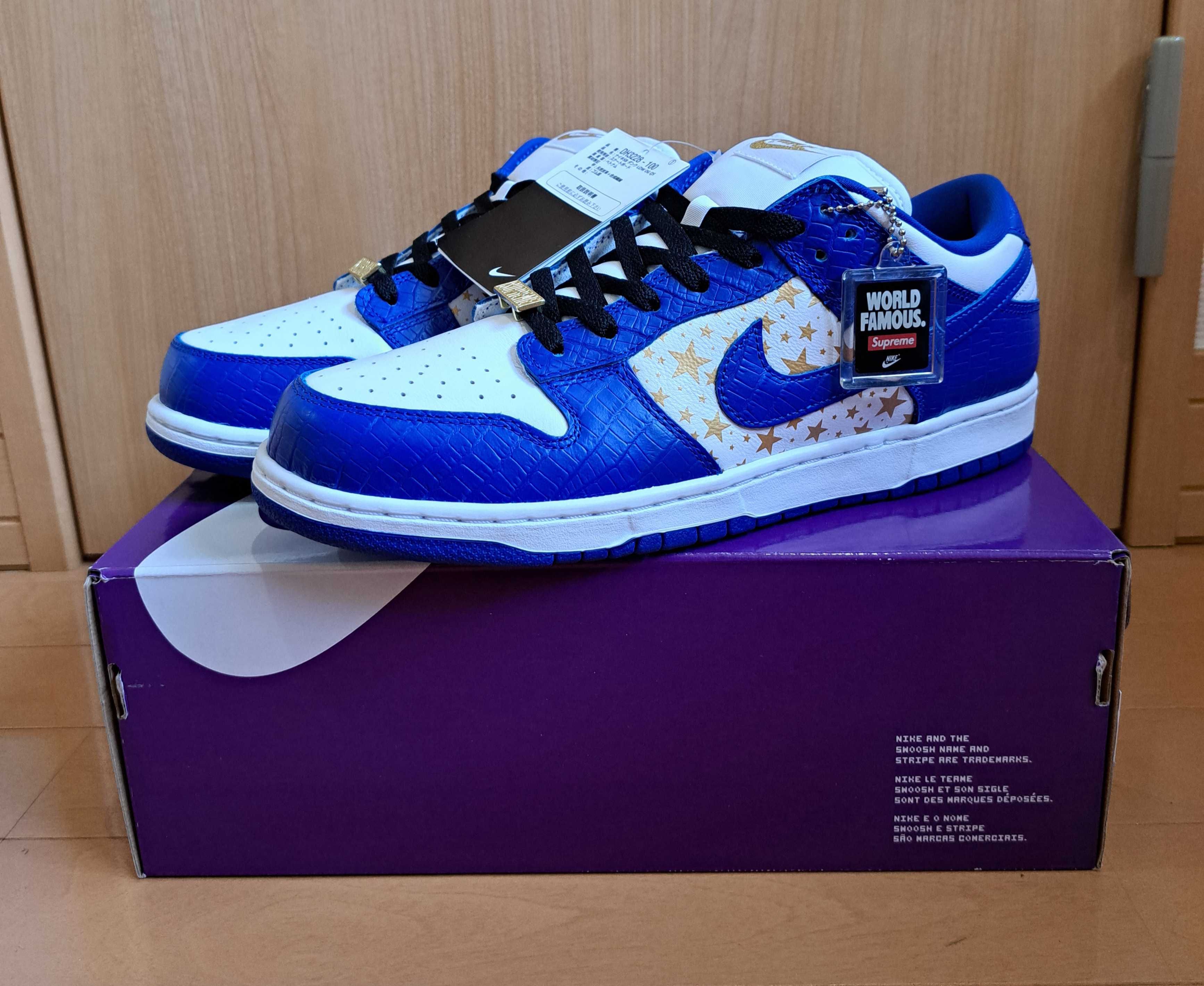 Supreme × Nike SB Dunk Low OG QS Gold Stars "White/Hyper Blue"