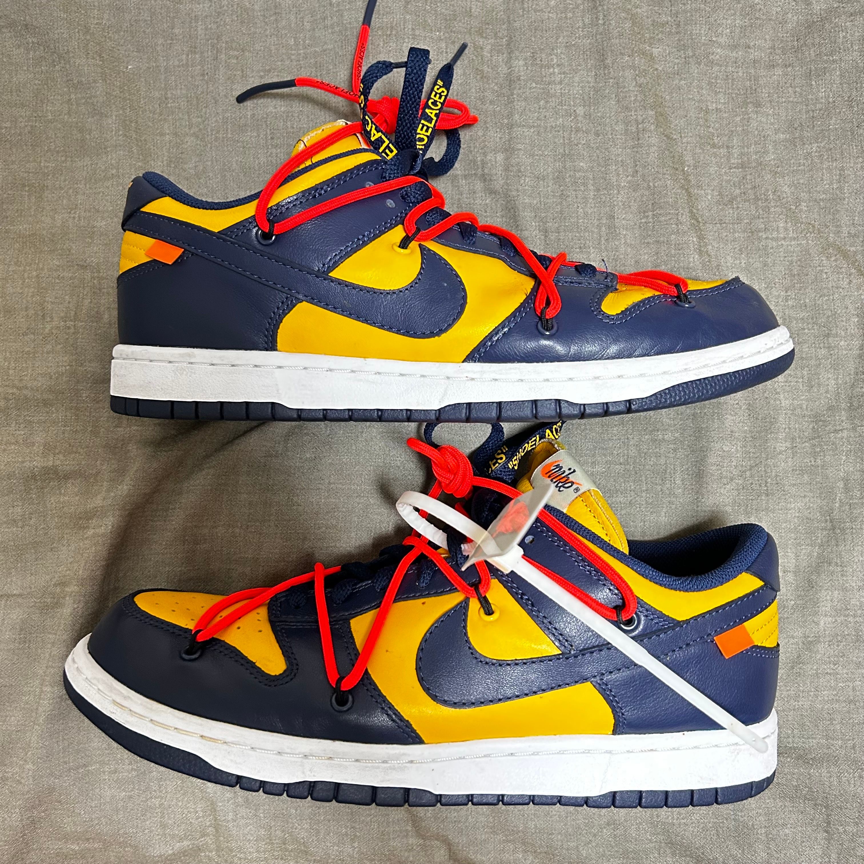 Off-White × Nike Dunk Low LTHR "University Gold/Midnight Navy/White"