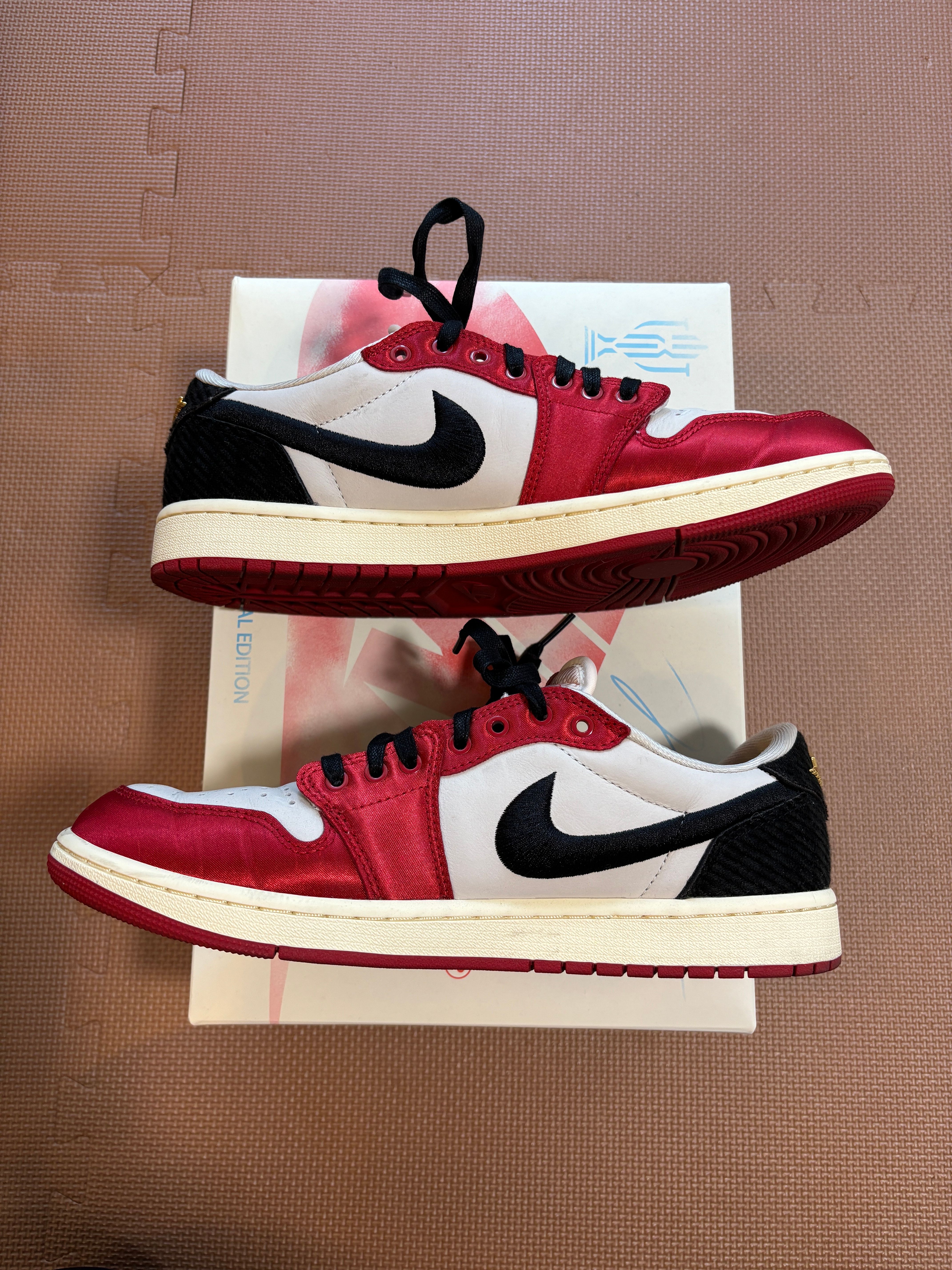 Trophy Room × Nike Air Jordan 1 Low OG "Sail and Varsity Red"