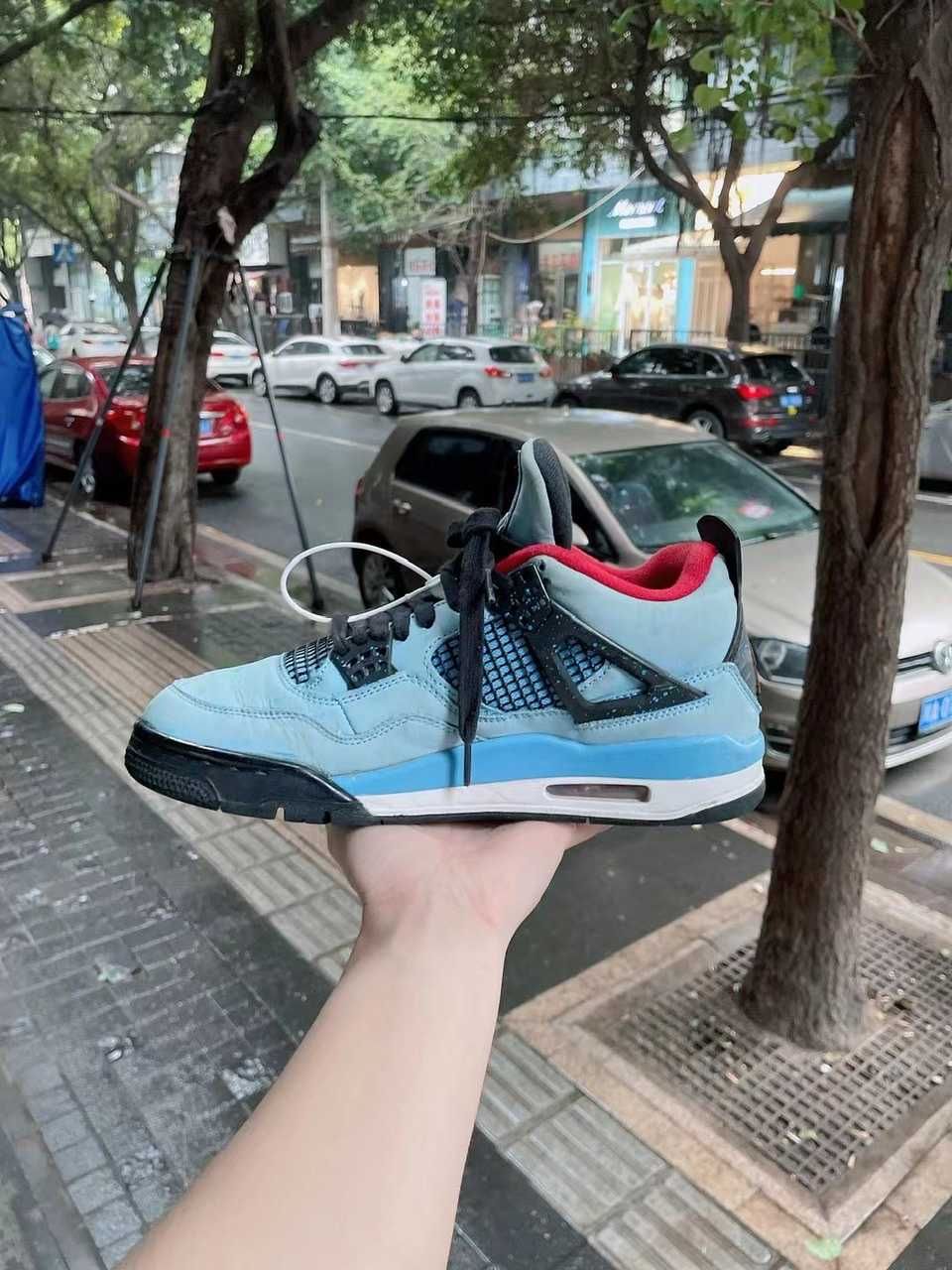 Travis Scott × Nike Air Jordan 4 Retro Cactus Jack "University Blue"