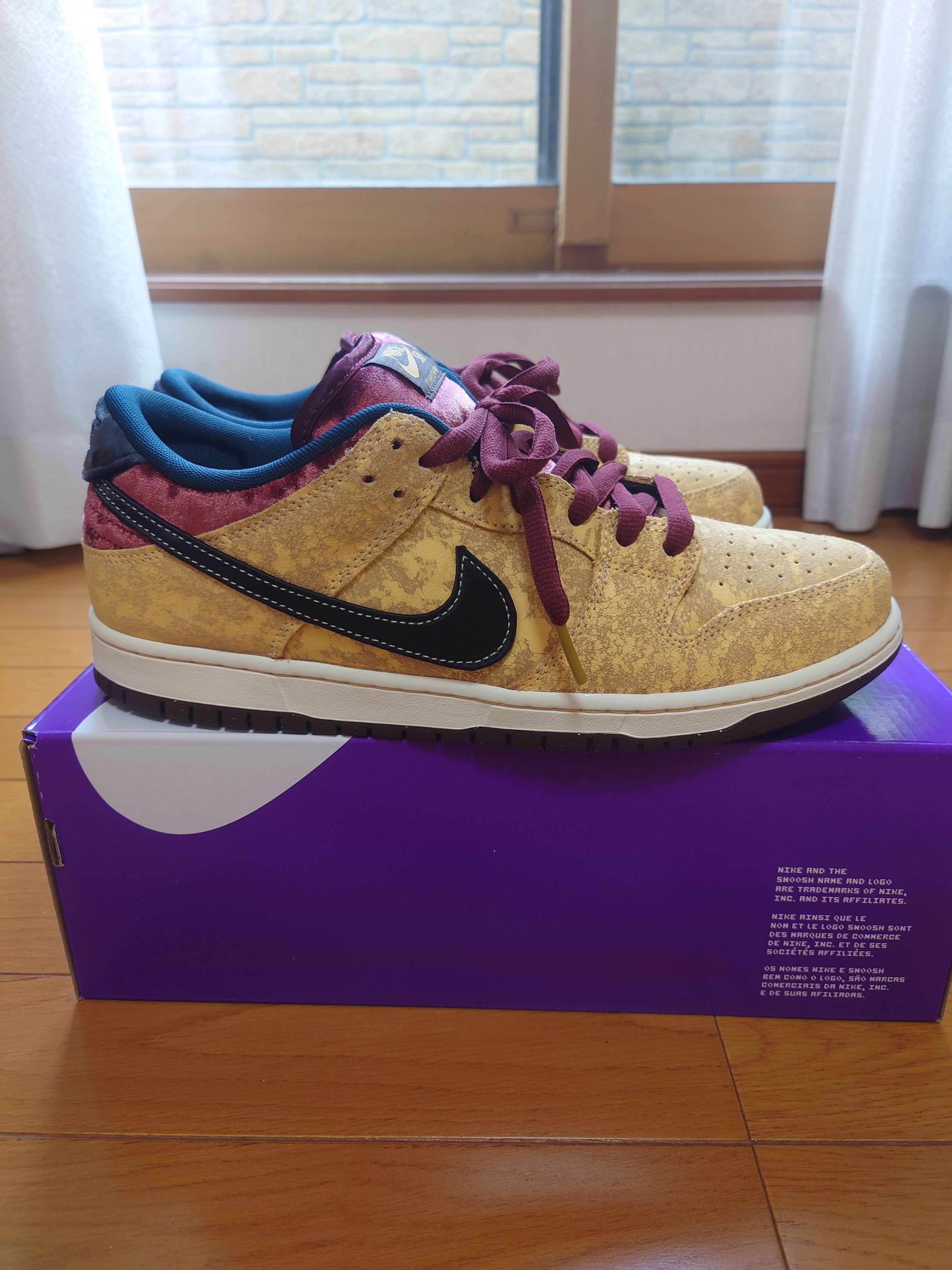 Nike SB Dunk Low Pro "City of Cinema/Celestial Gold and Dark Team Red"