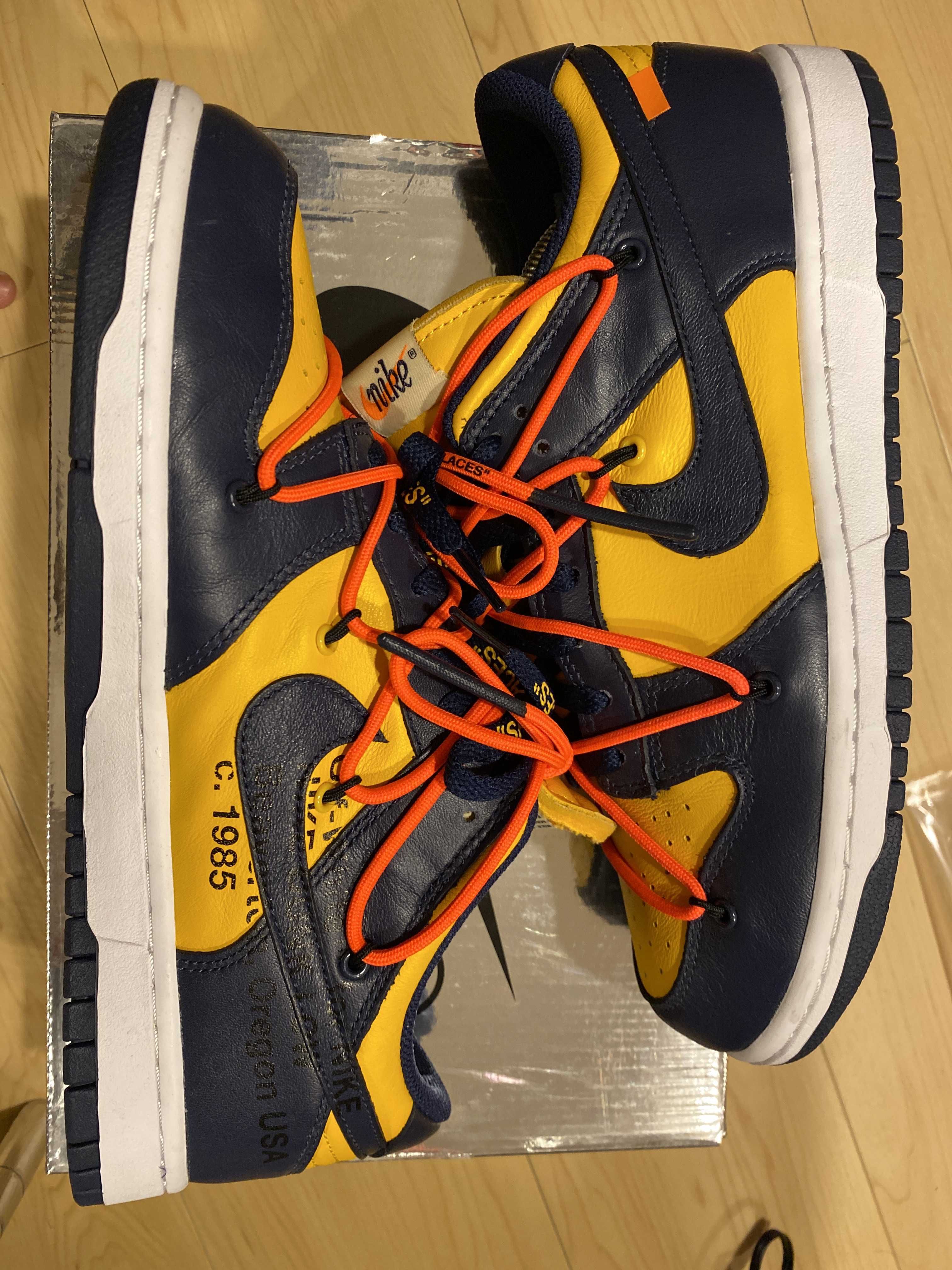 Off-White × Nike Dunk Low LTHR "University Gold/Midnight Navy/White"