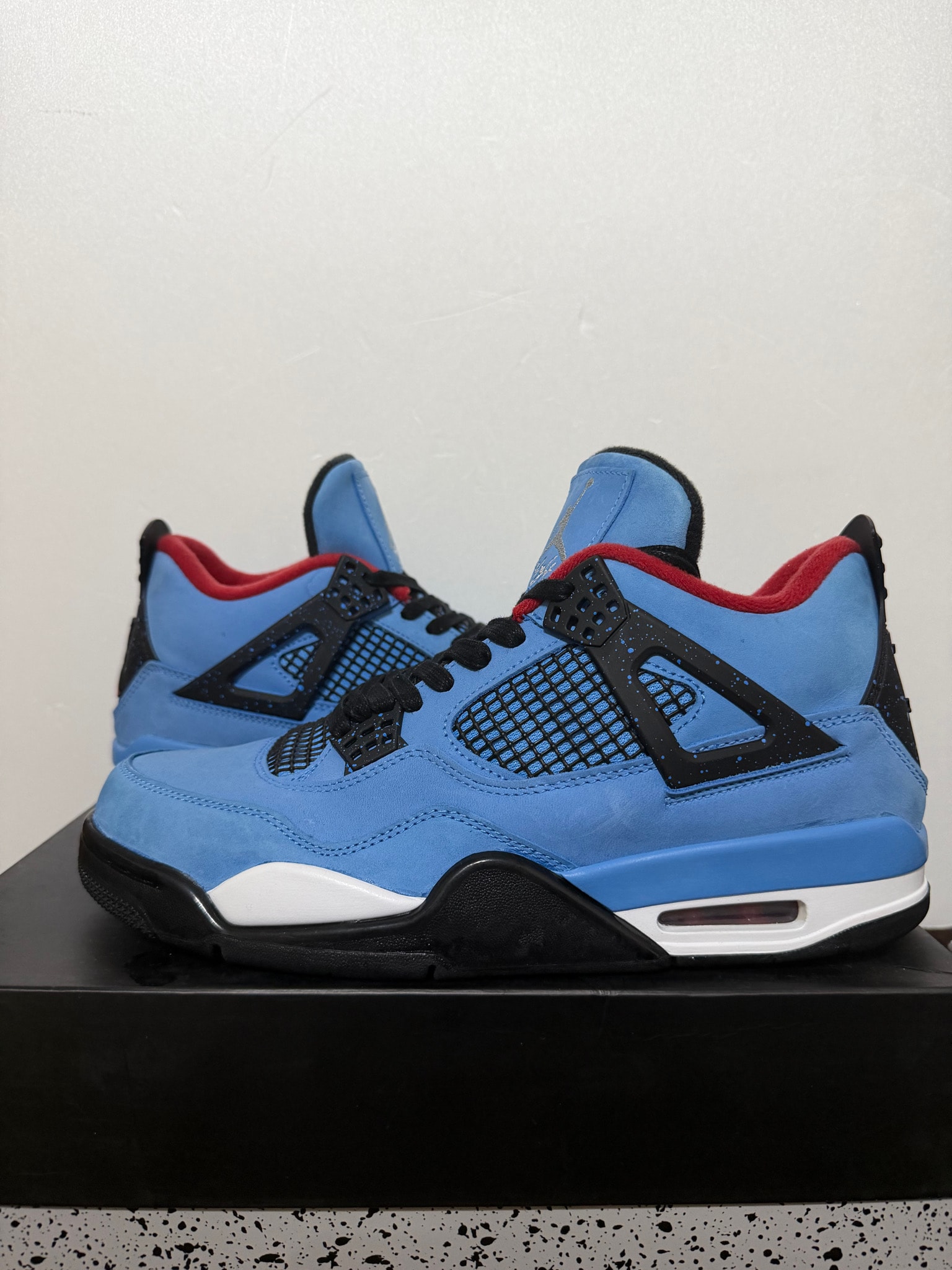 Travis Scott × Nike Air Jordan 4 Retro Cactus Jack "University Blue"
