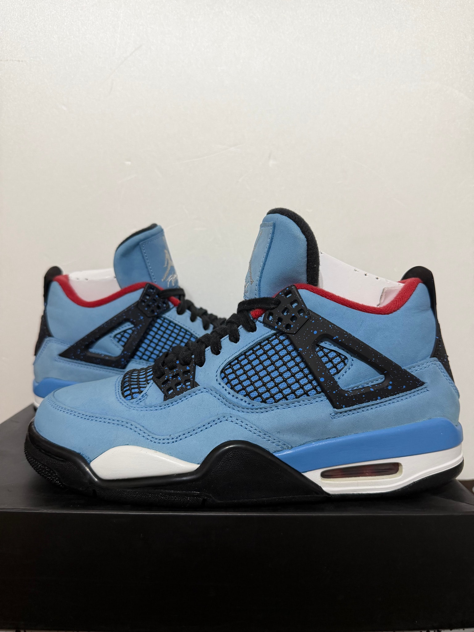 Travis Scott × Nike Air Jordan 4 Retro Cactus Jack "University Blue"
