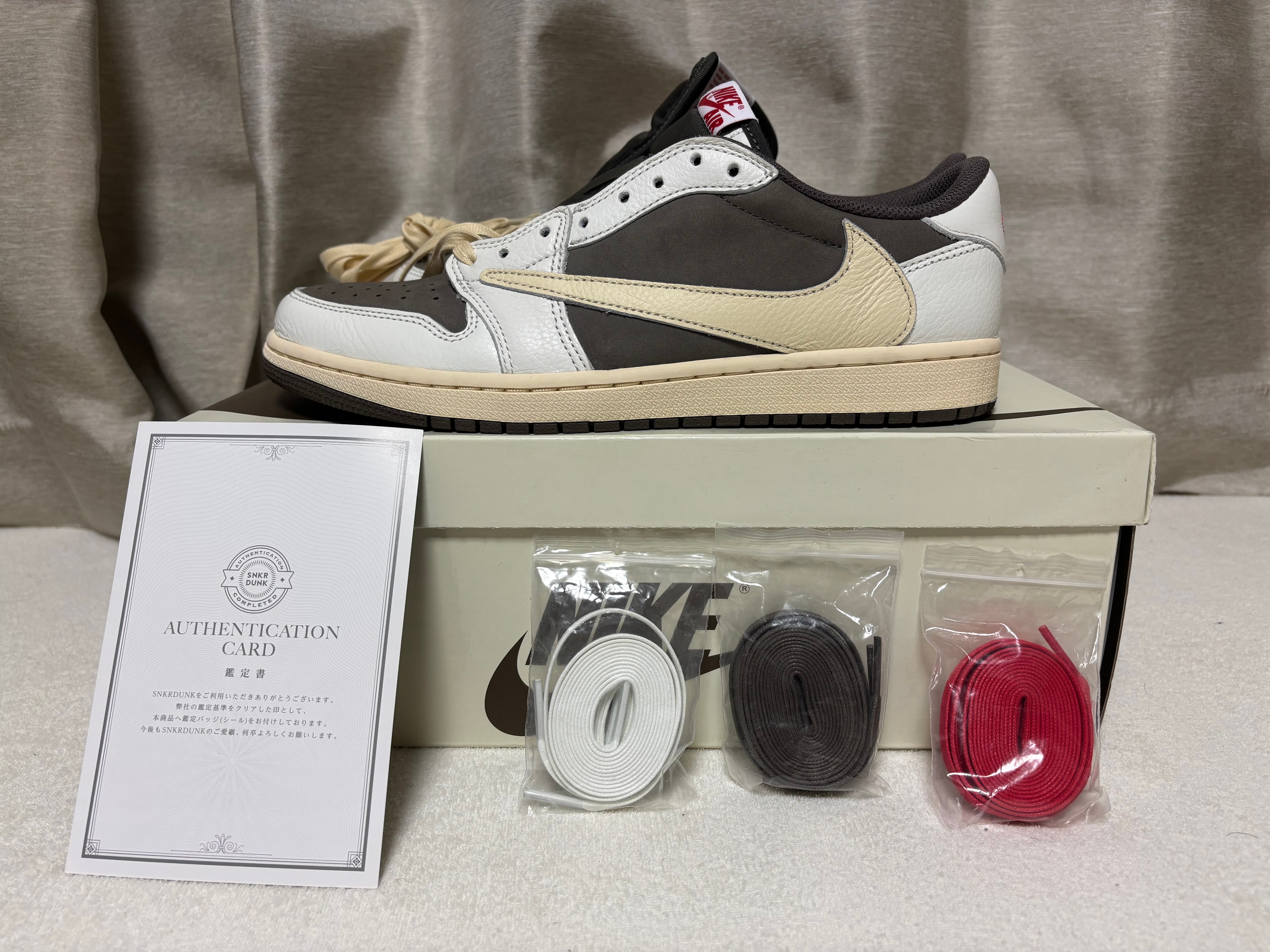 Travis Scott × Nike Air Jordan 1 Low OG SP "Reverse Mocha/Sail and Ridgerock"