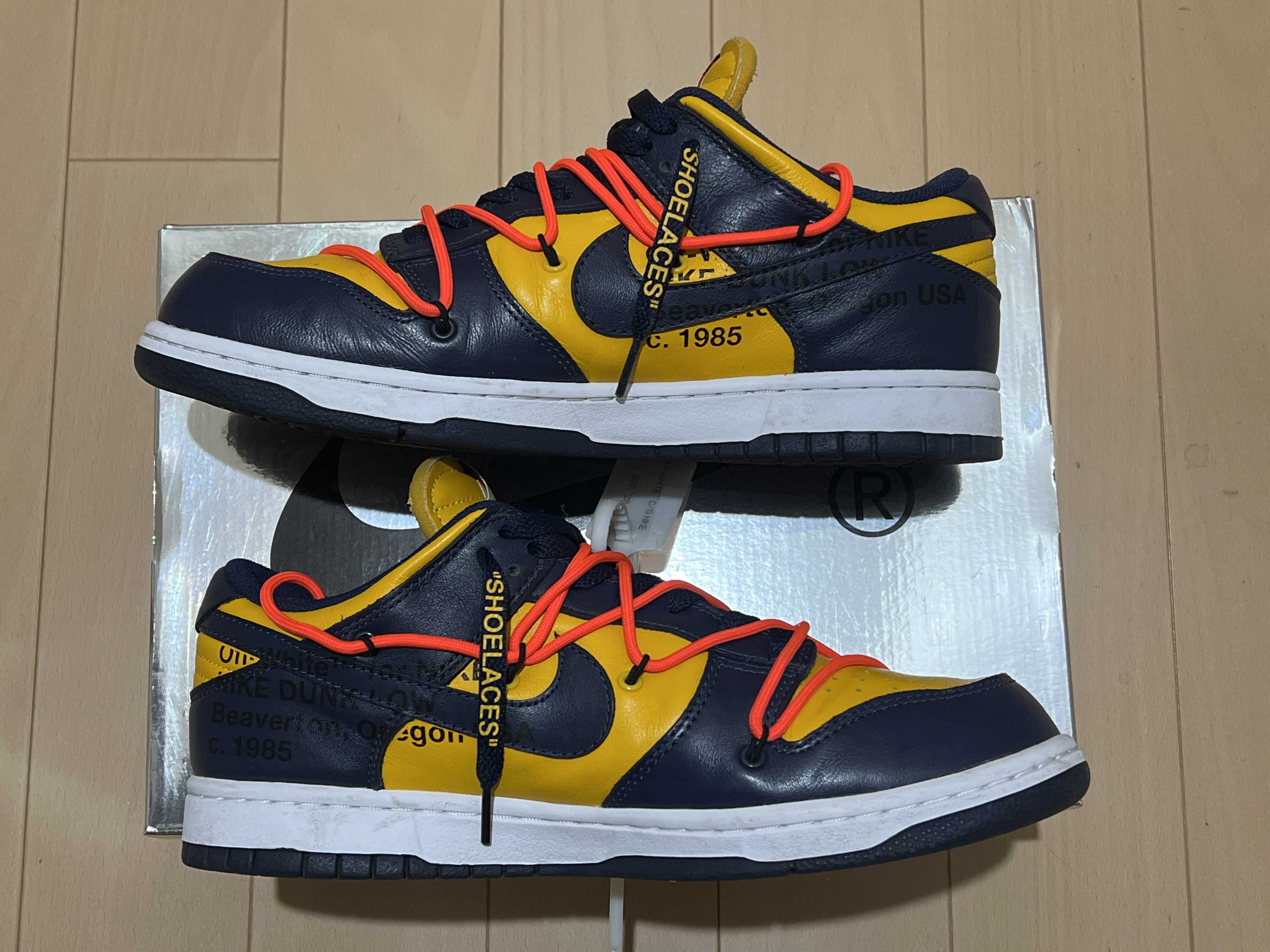 Off-White × Nike Dunk Low LTHR "University Gold/Midnight Navy/White"
