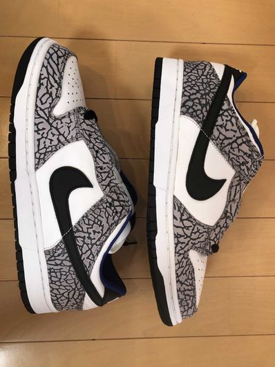 Supreme × Nike SB Dunk Low "White Cement/Safari" (2002)