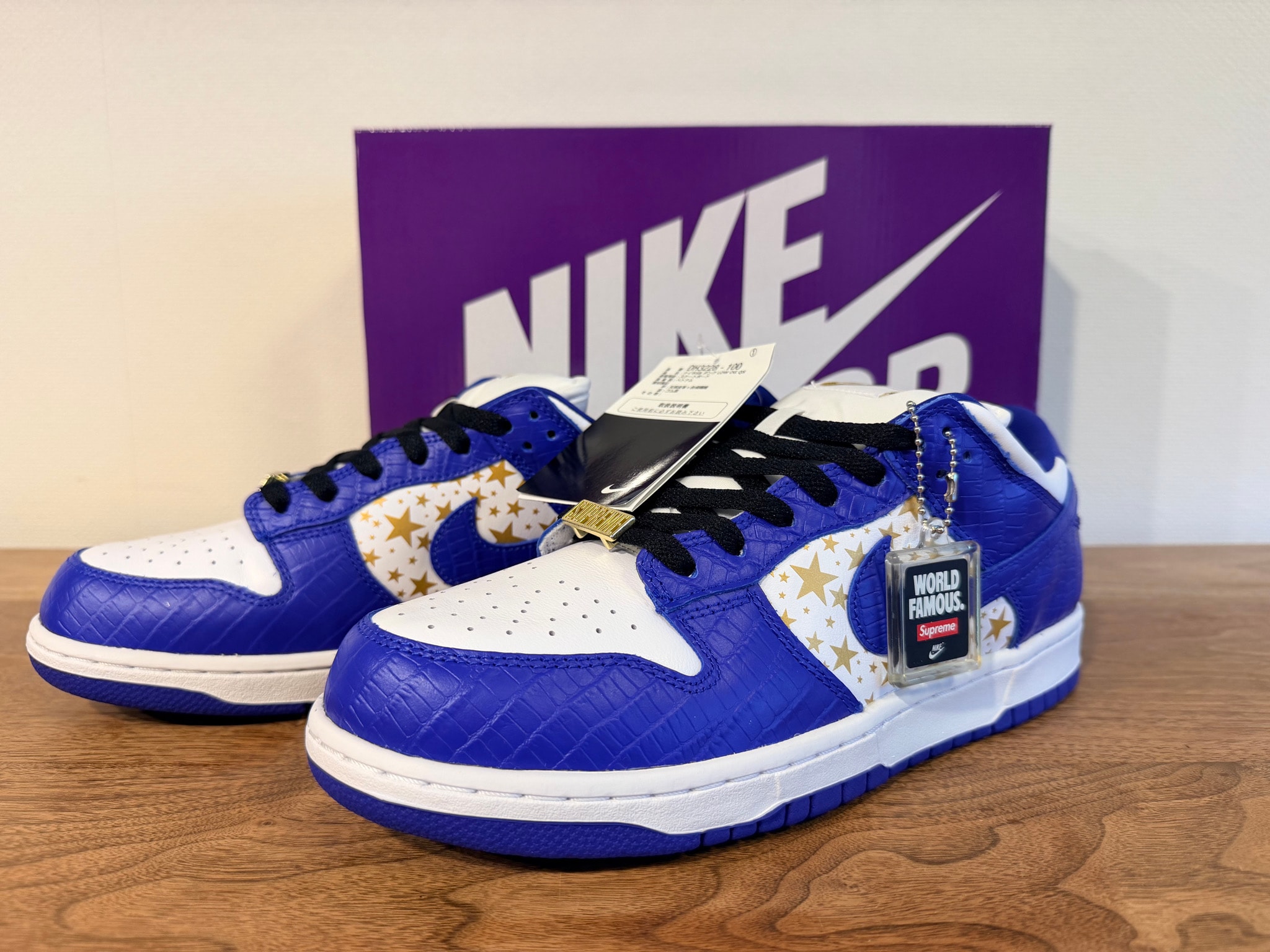 Supreme × Nike SB Dunk Low OG QS Gold Stars "White/Hyper Blue"