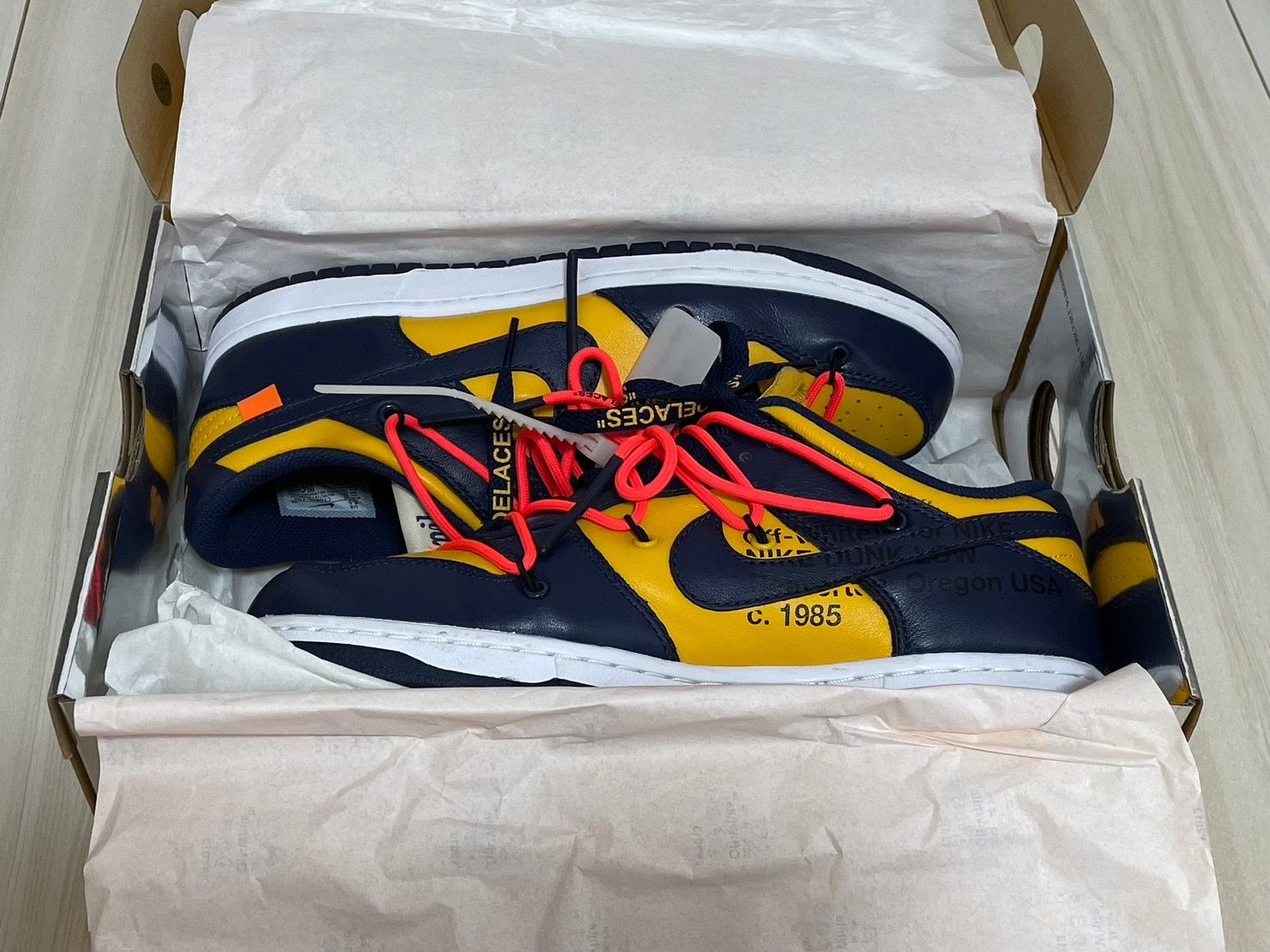 Off-White × Nike Dunk Low LTHR "University Gold/Midnight Navy/White"