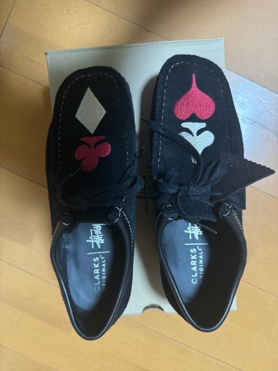 Stussy × Clarks Wallabee "Black Suede/Red/Gold"