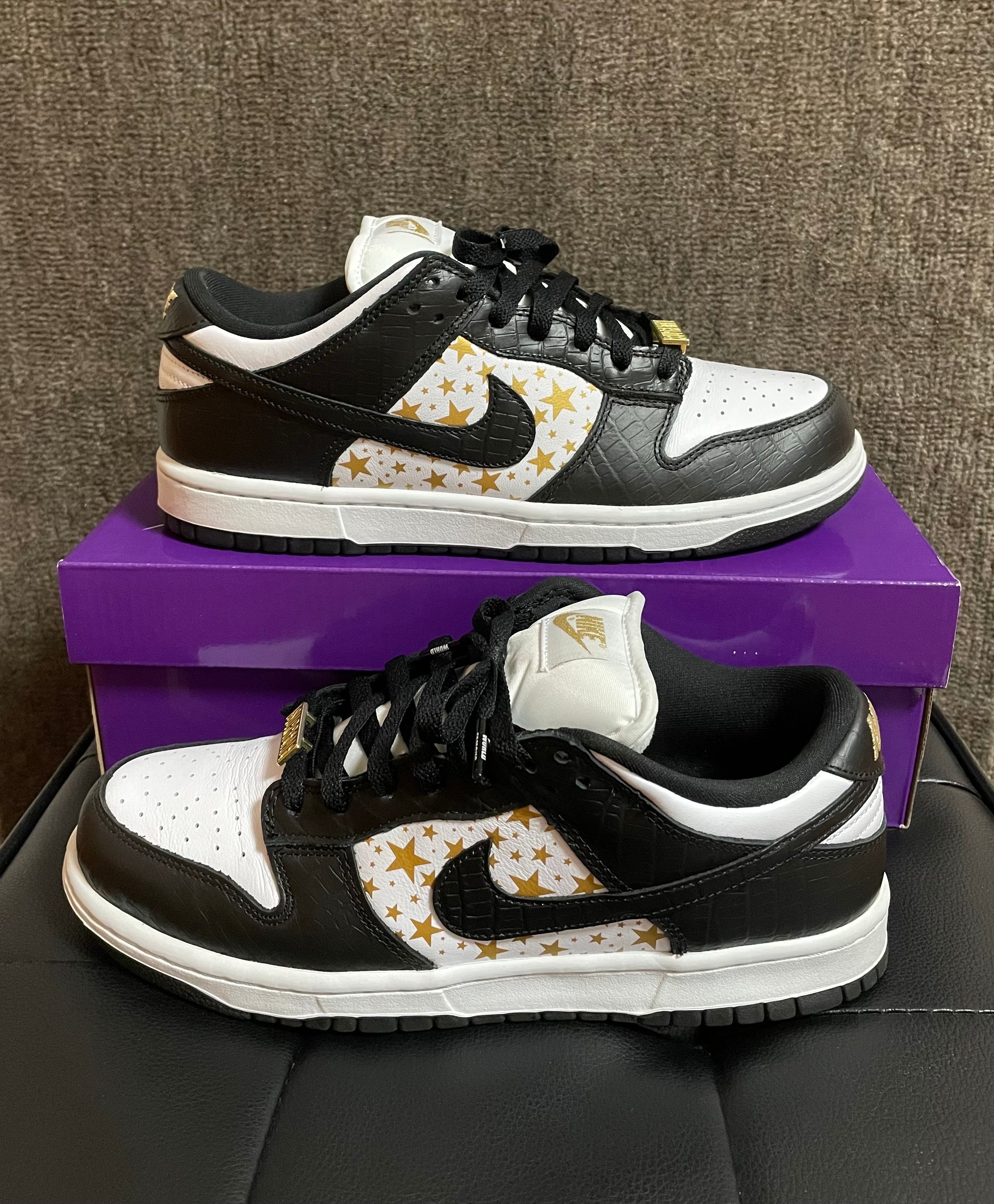 Supreme × Nike SB Dunk Low OG QS Gold Stars "White/Black"