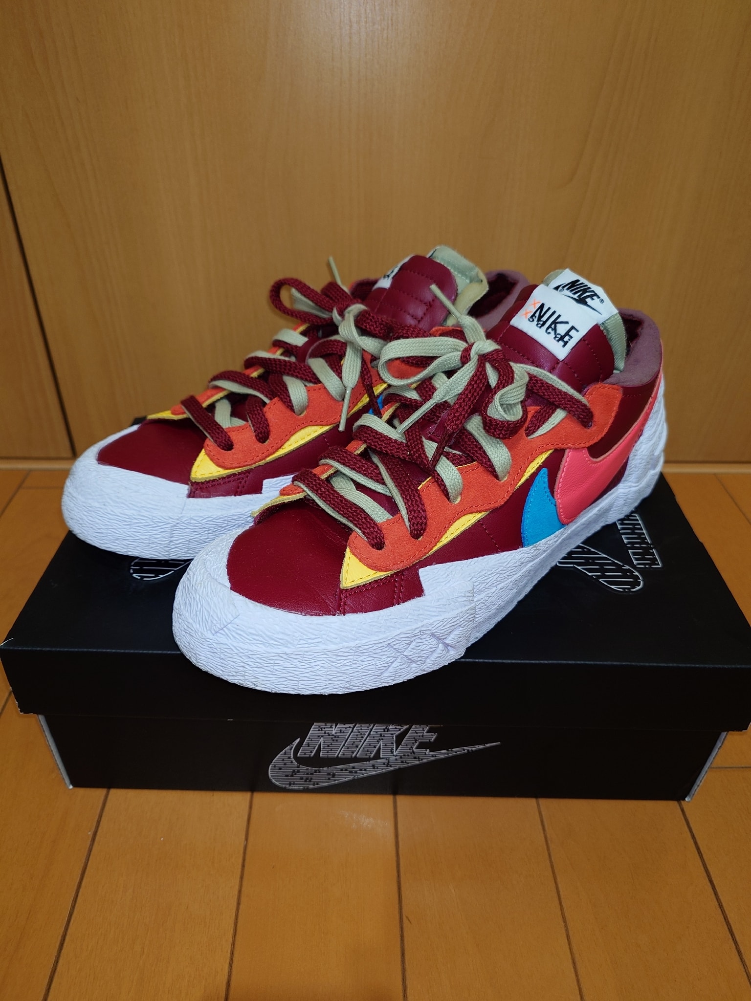 KAWS × sacai × Nike Blazer Low "Team Red"