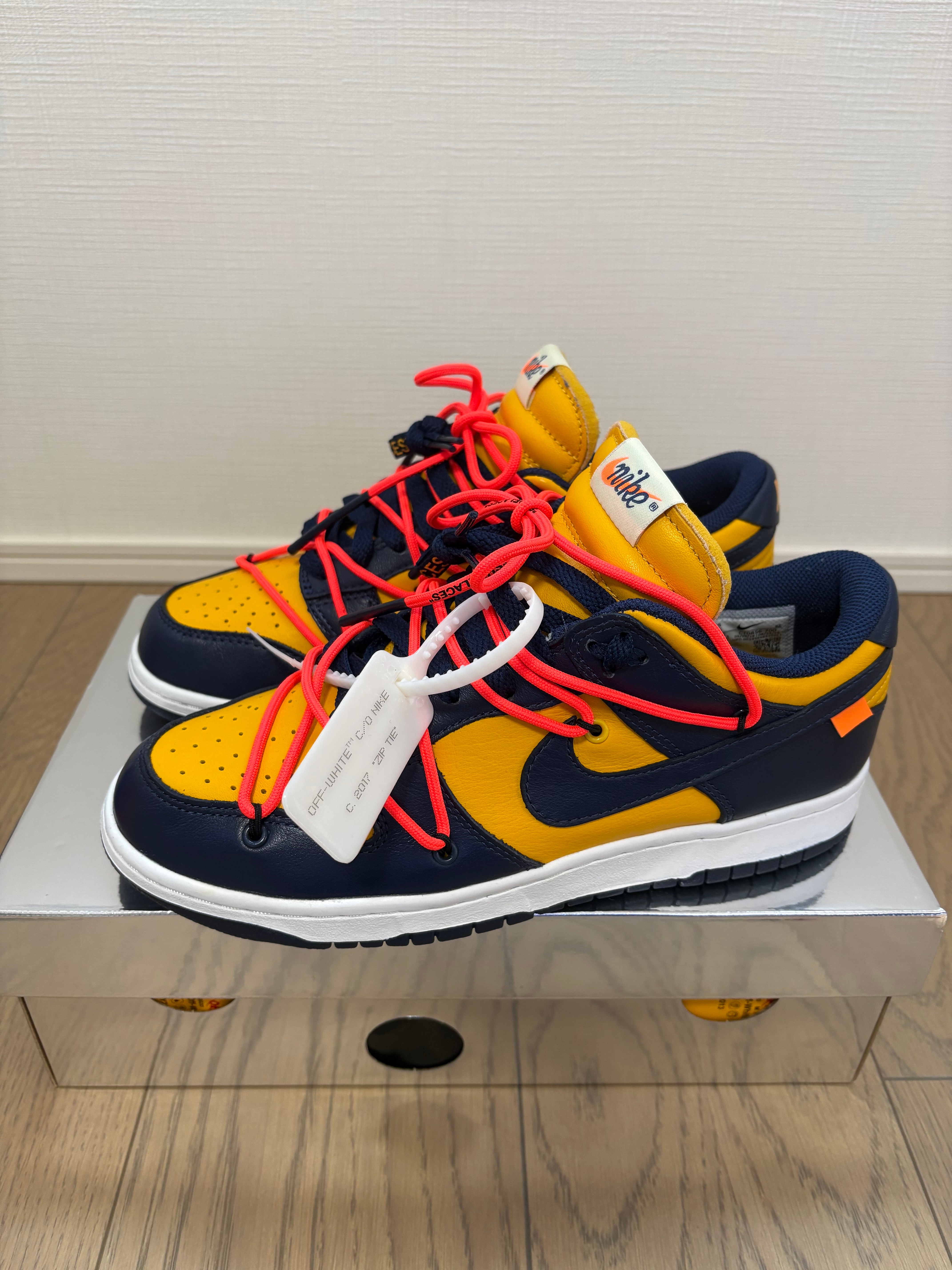 Off-White × Nike Dunk Low LTHR "University Gold/Midnight Navy/White"