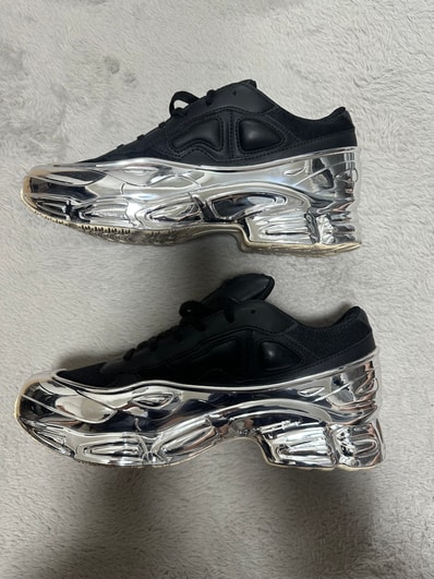 RAF SIMONS × adidas Ozweego "Black/Silver Metallic"