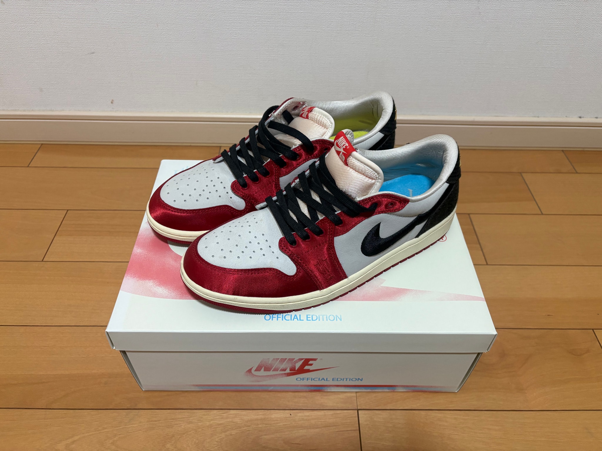 Trophy Room × Nike Air Jordan 1 Low OG "Sail and Varsity Red"