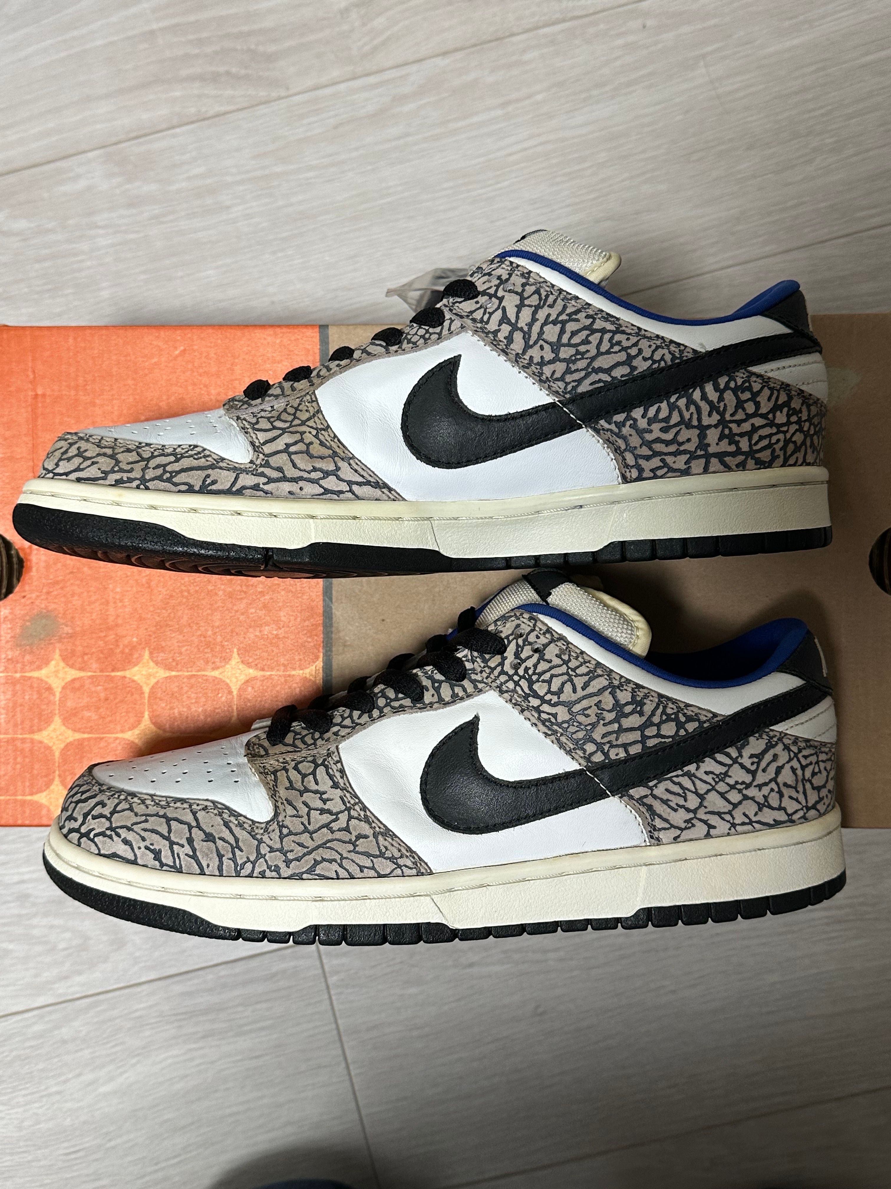 Supreme × Nike SB Dunk Low "White Cement/Safari" (2002)