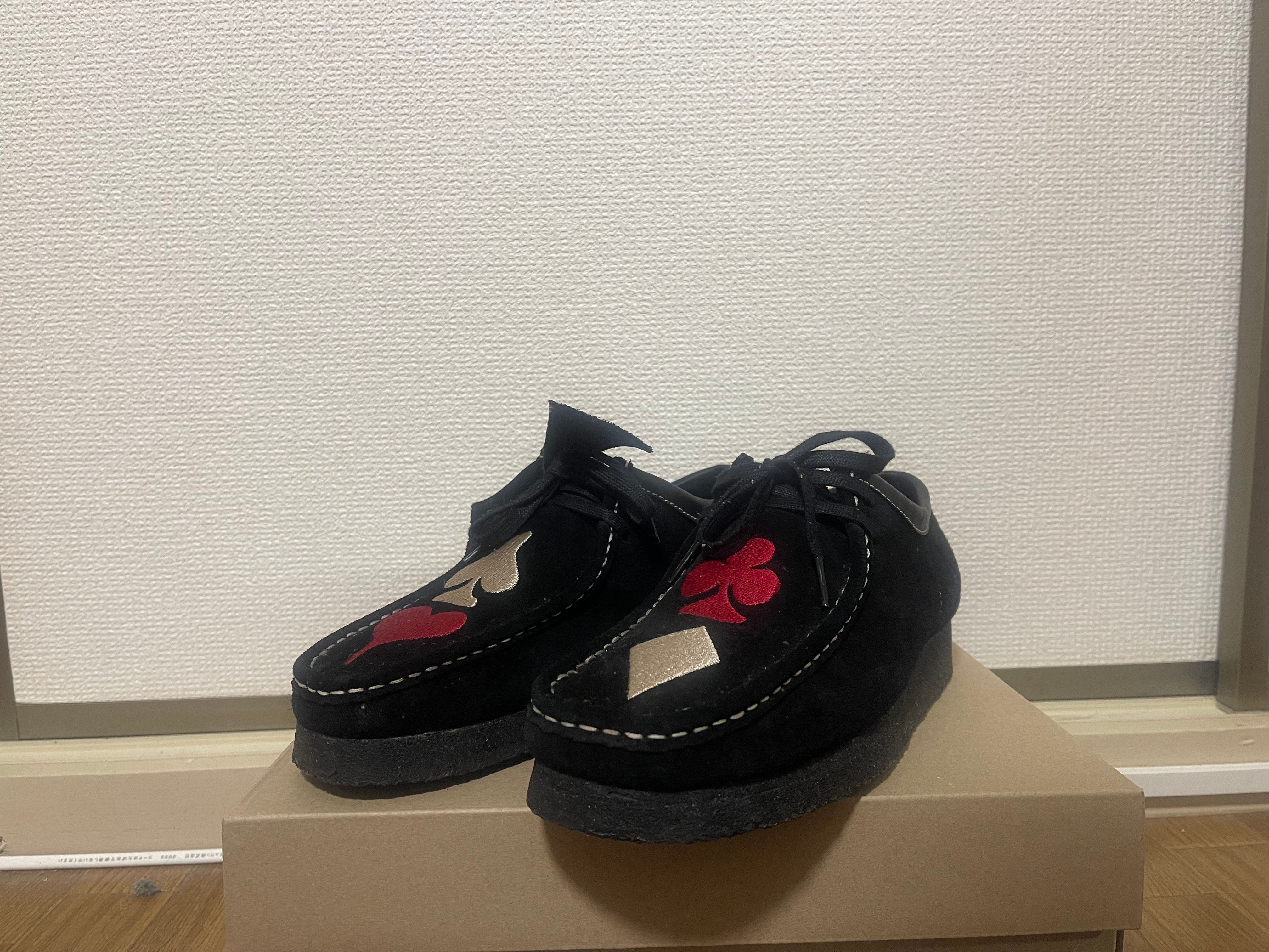 Stussy × Clarks Wallabee "Black Suede/Red/Gold"