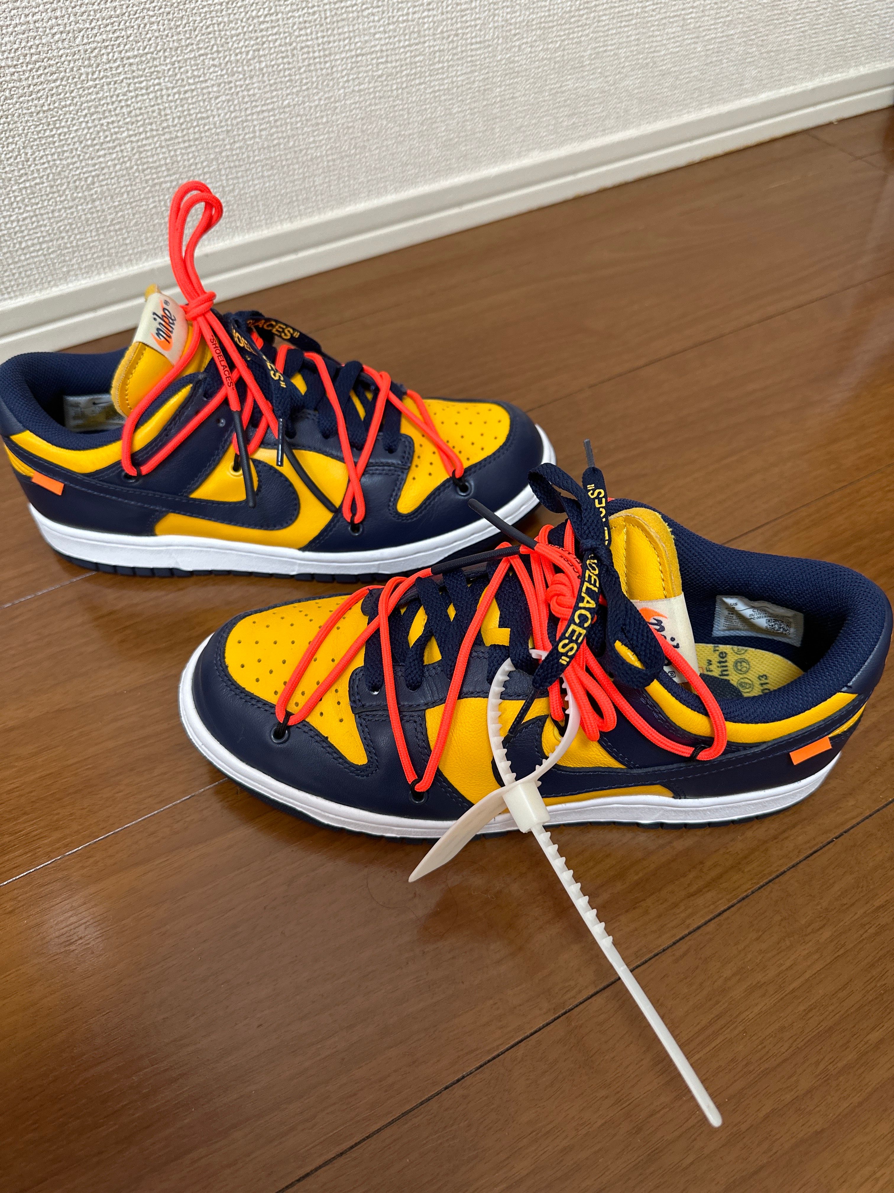 Off-White × Nike Dunk Low LTHR "University Gold/Midnight Navy/White"