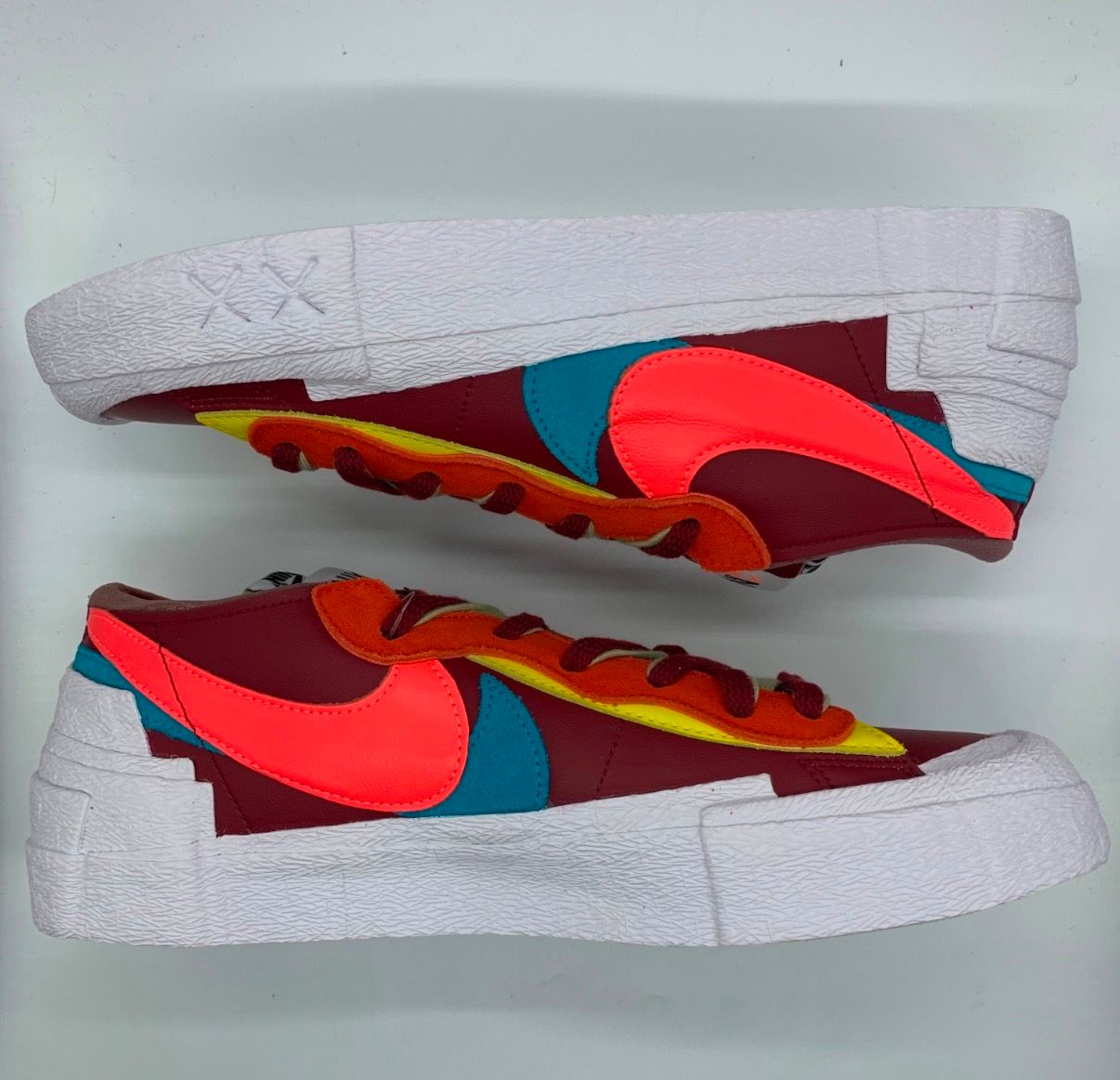 KAWS × sacai × Nike Blazer Low "Team Red"