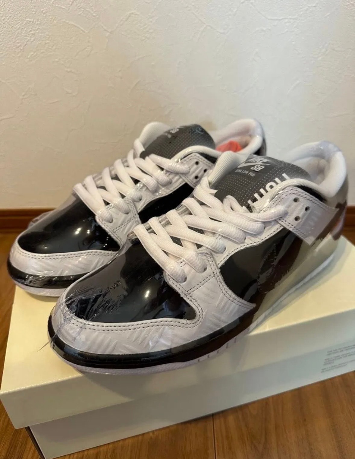 TIGHTBOOTH × Nike SB Dunk Low Pro QS "Black and White"