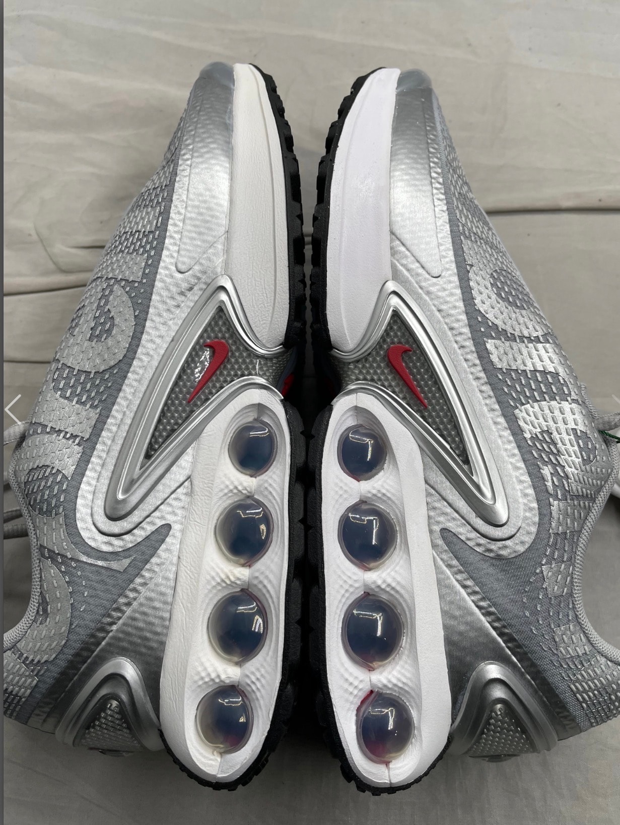 Supreme × Nike Air Max DN "Metallic Silver/University Red/White"
