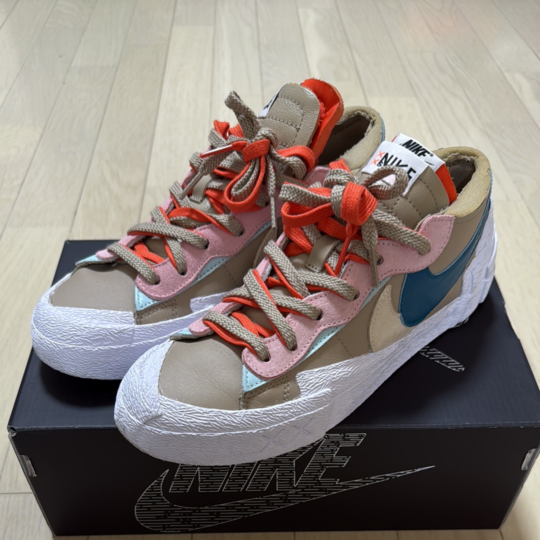 KAWS × sacai × Nike Blazer Low "Reed"