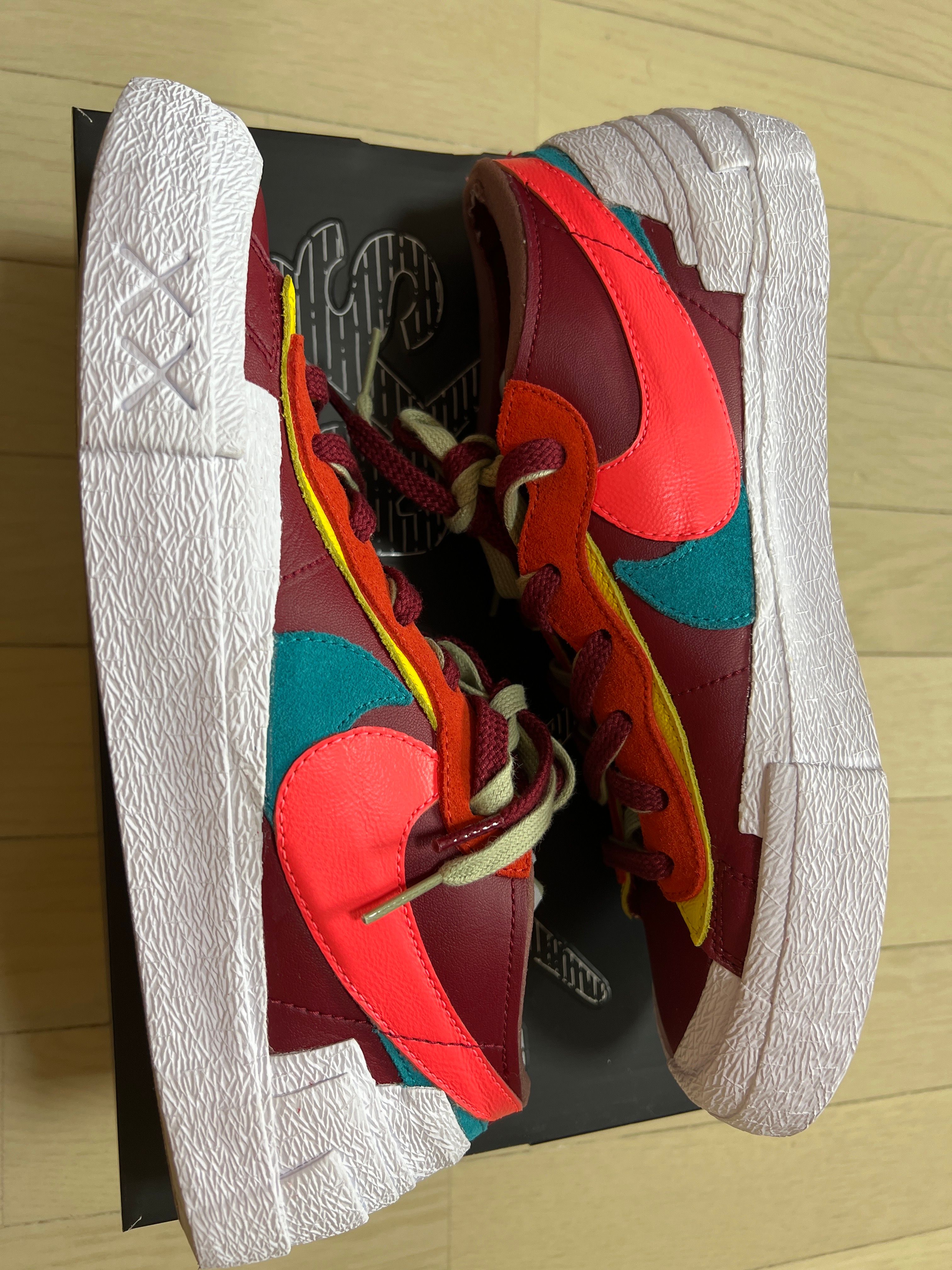 KAWS × sacai × Nike Blazer Low "Team Red"