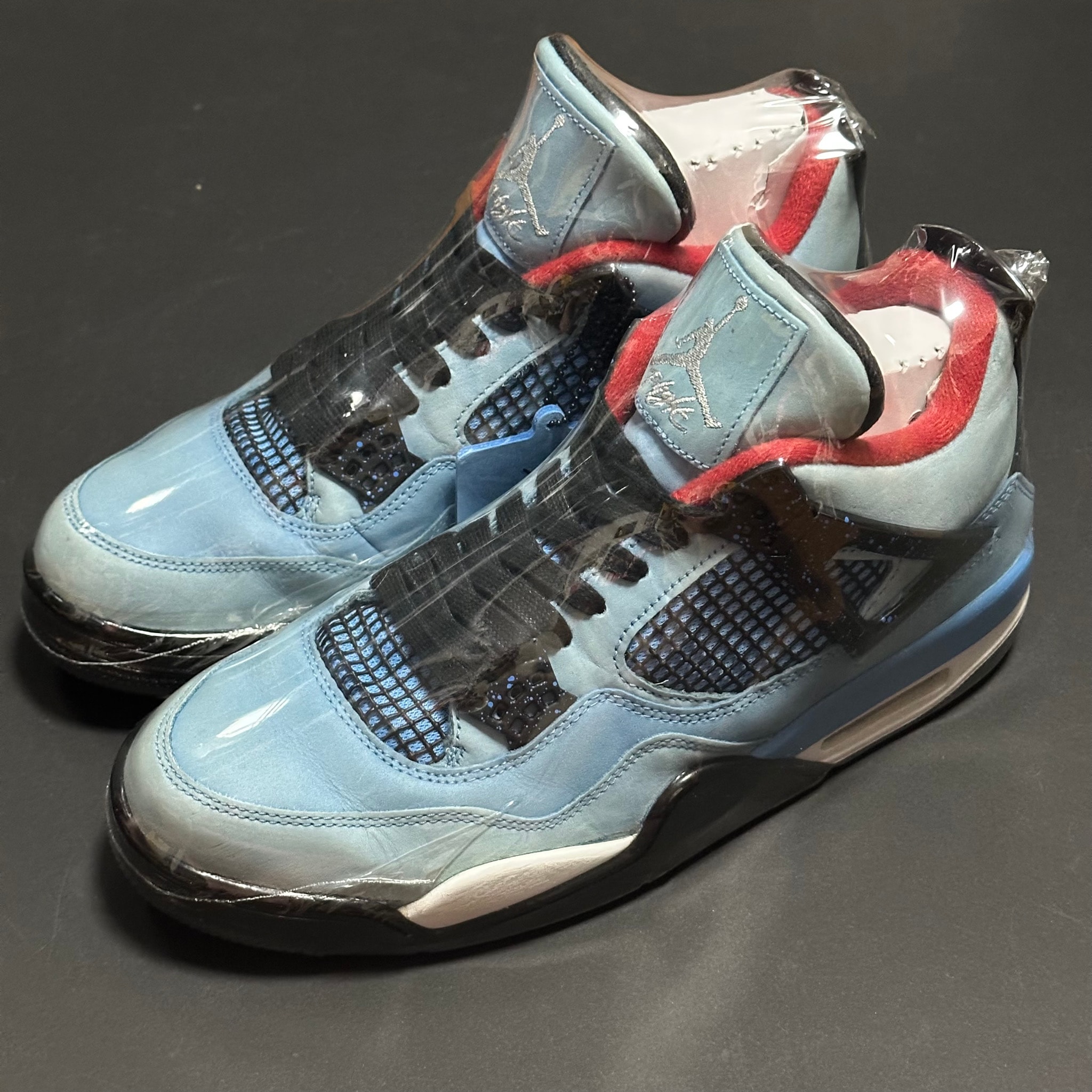 Travis Scott × Nike Air Jordan 4 Retro Cactus Jack "University Blue"