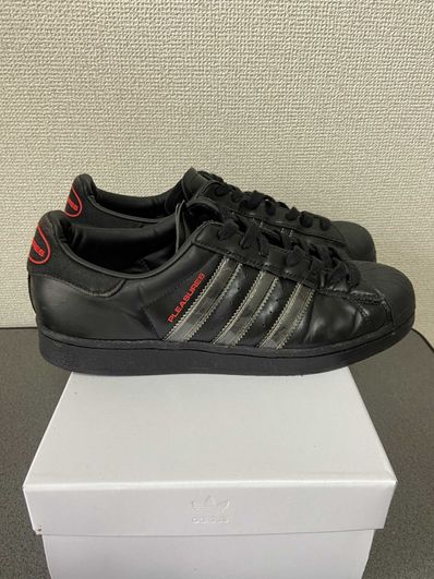 PLEASURES × adidas CONSORTIUM SUPERSTAR "BLACK"