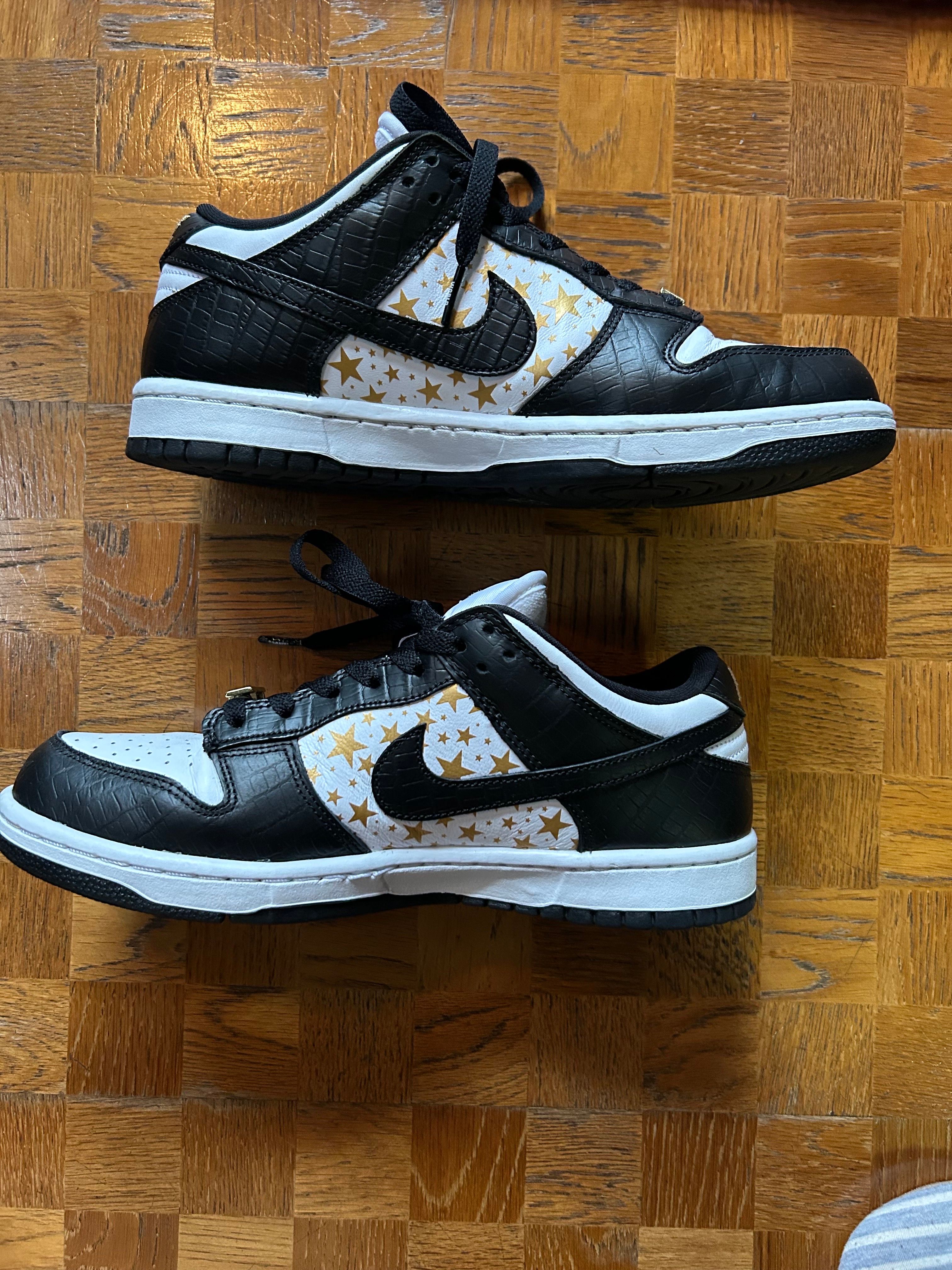 Supreme × Nike SB Dunk Low OG QS Gold Stars "White/Black"