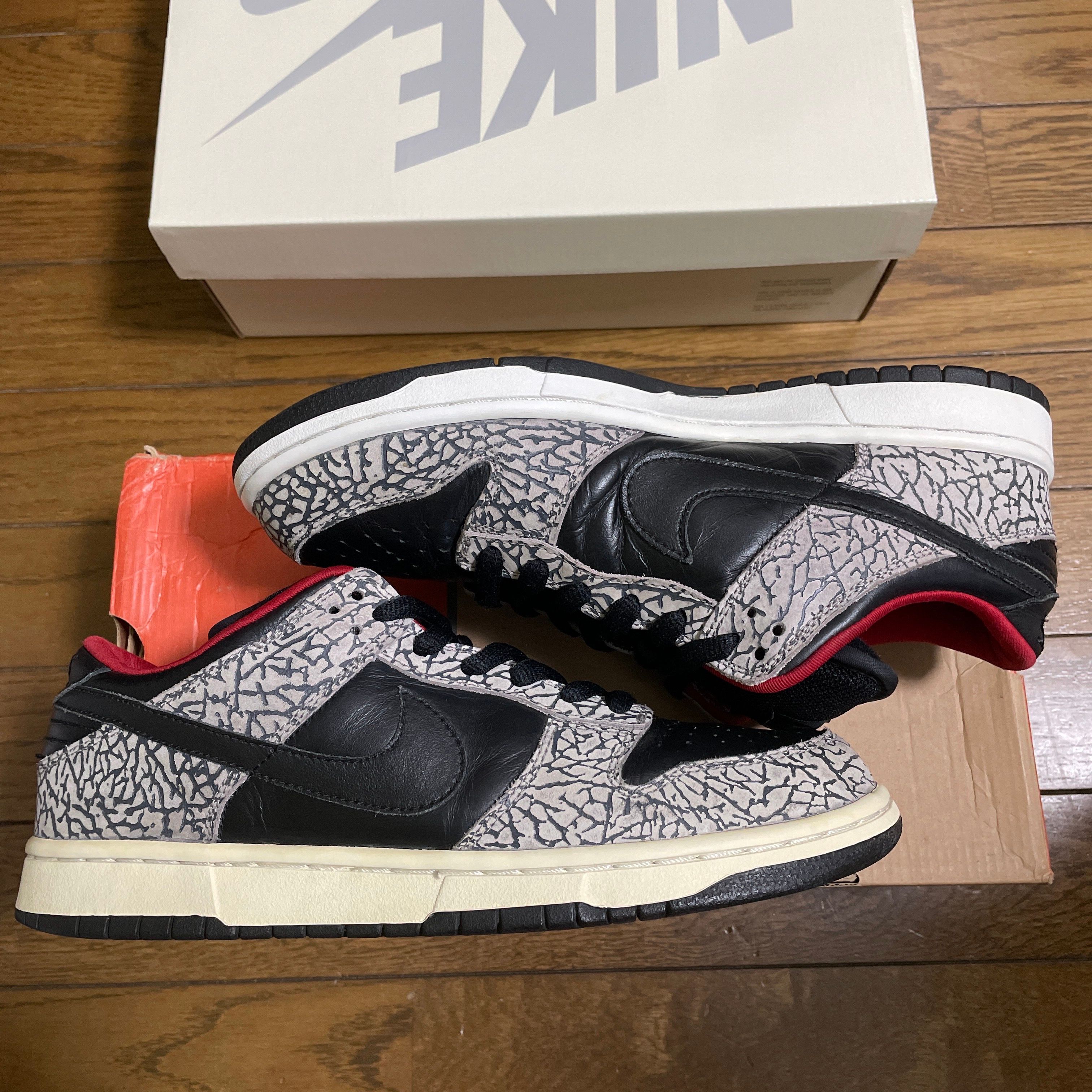 Supreme × Nike SB Dunk Low "Black Cement/Safari" (2002)